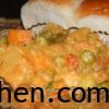 Mixed Vegetable Kurma in a glass bowl served with ladi pav or bread
