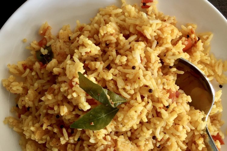 Tomato rice served in a plate