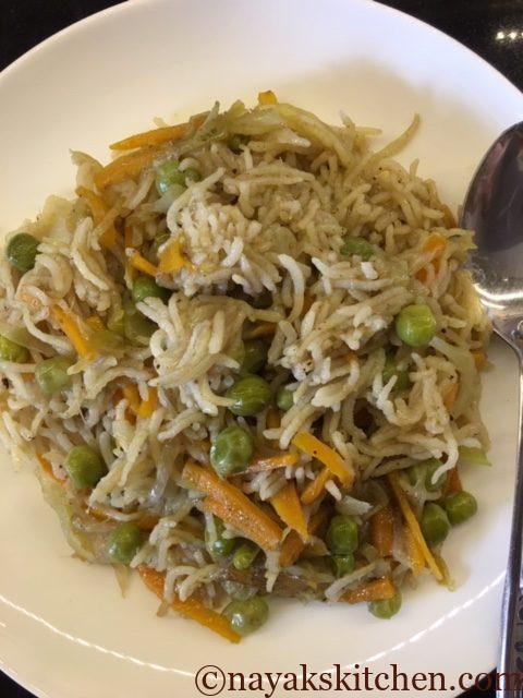 Coriander stalks pulao served in a plate