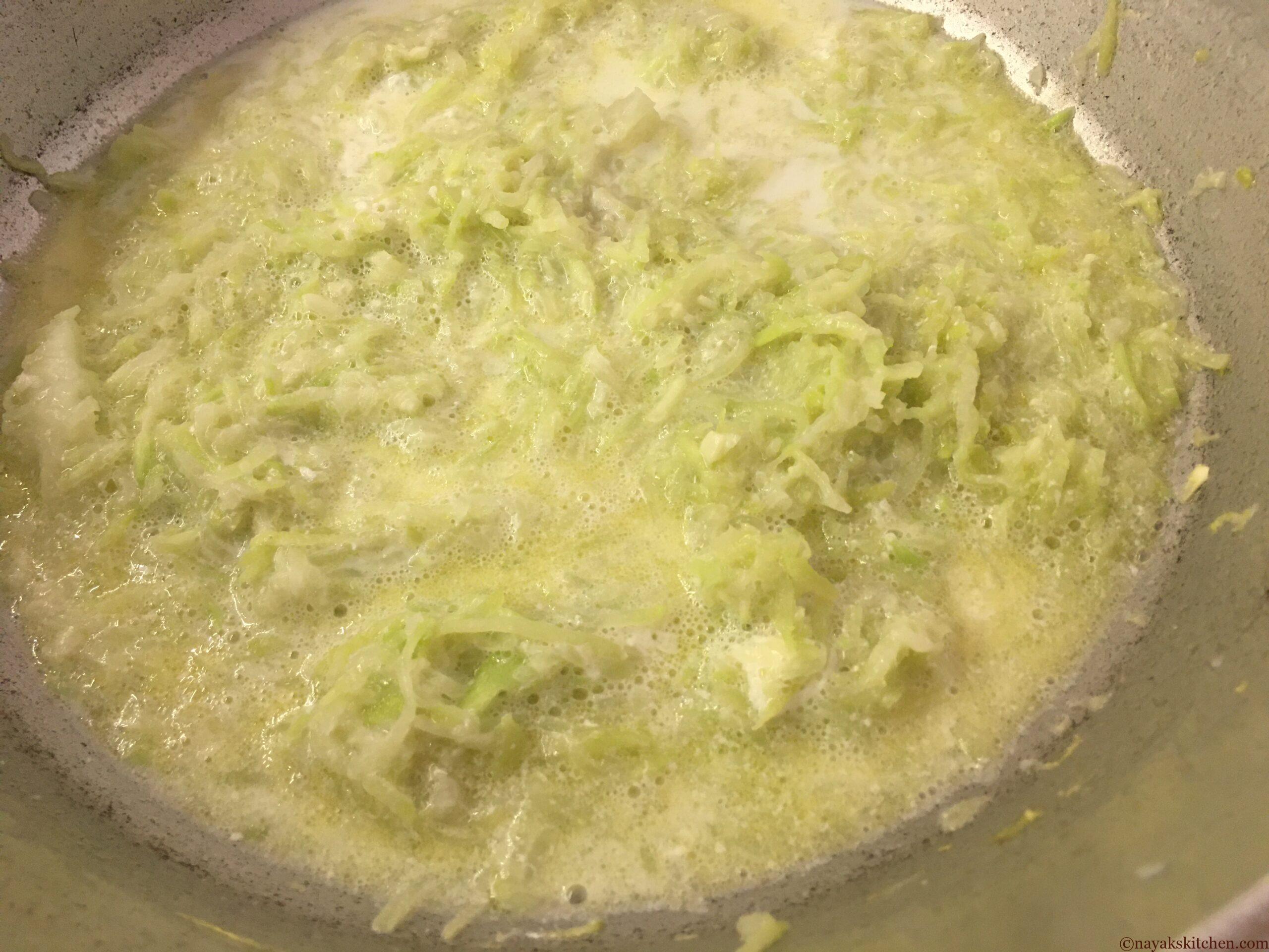 Simmering dudhi with milk