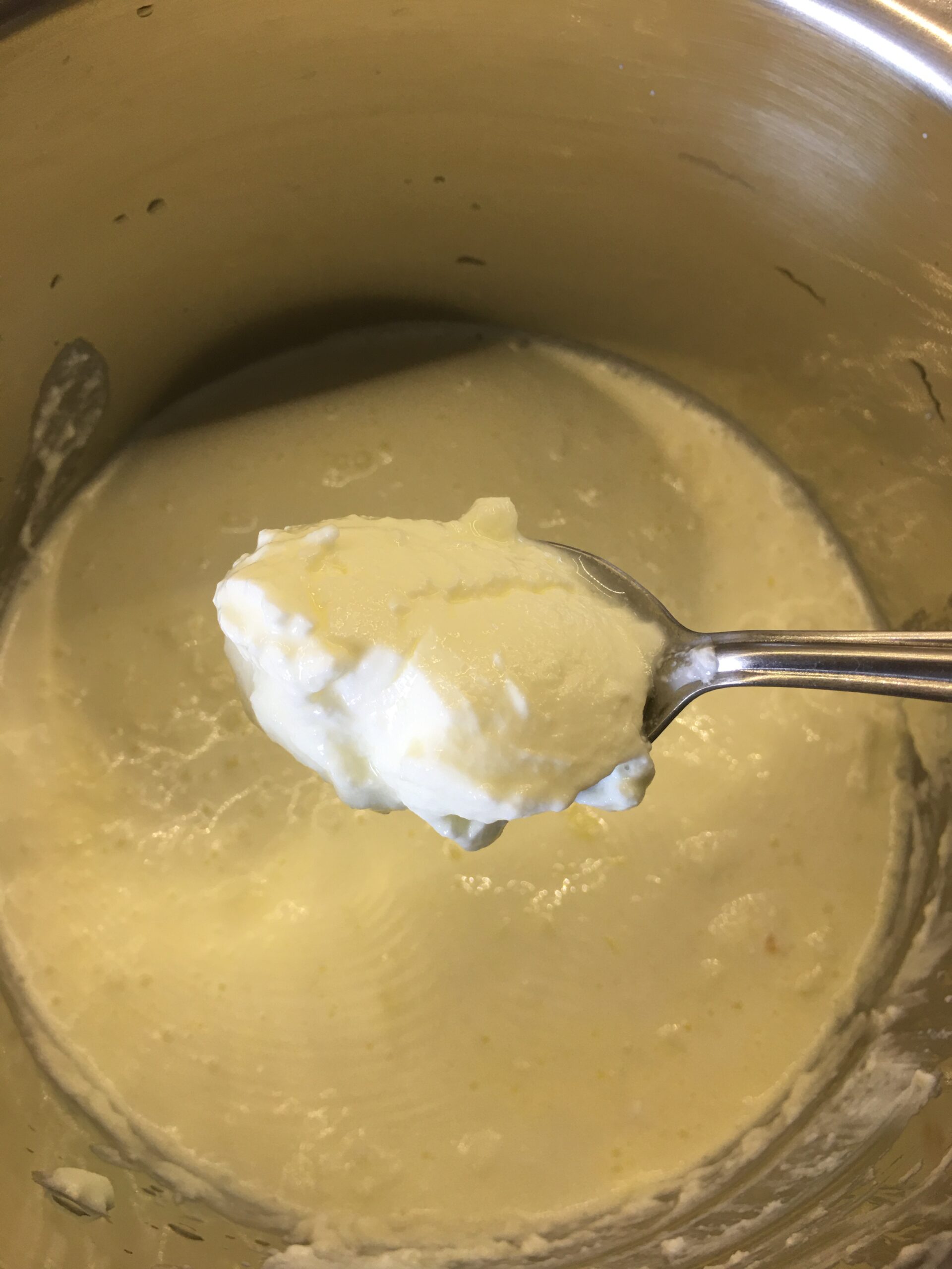 Adding fresh curd to cream