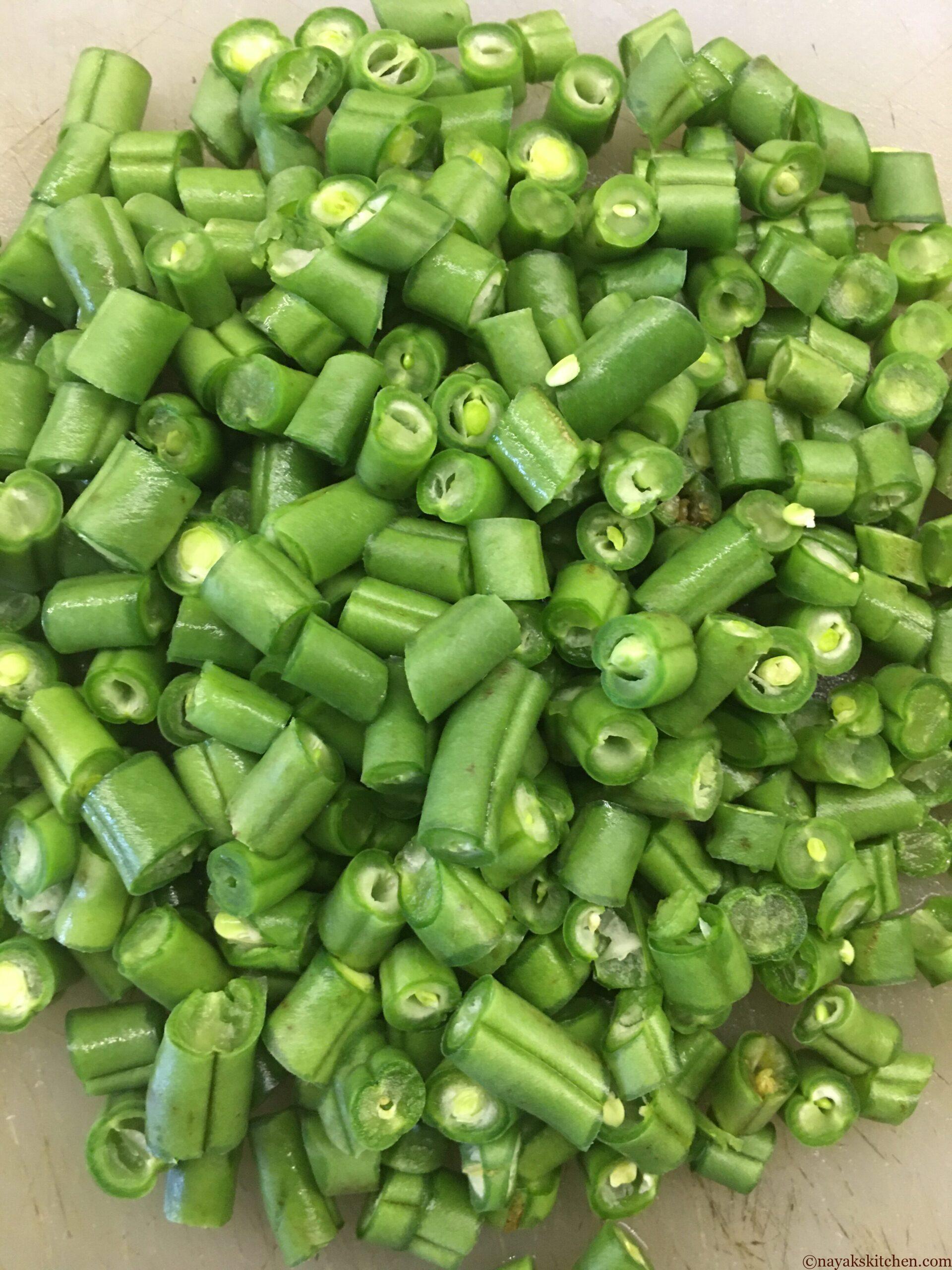 French beans chopped to prepare val papdichi bhaji
