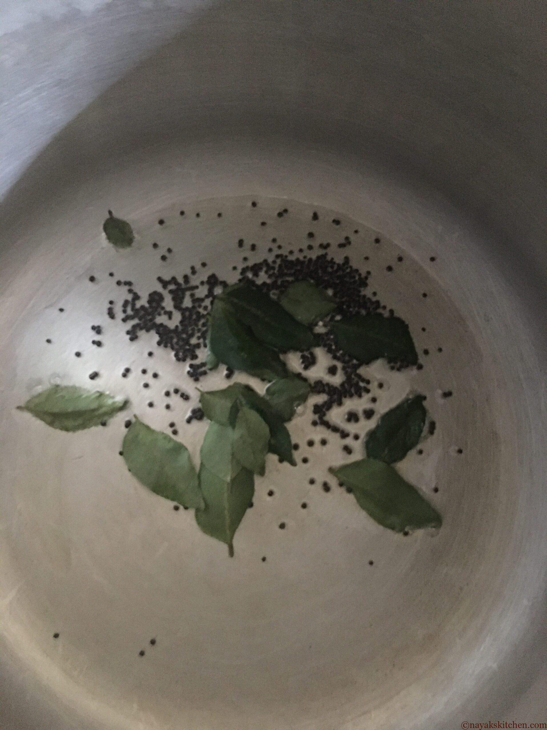 Adding curry leaves