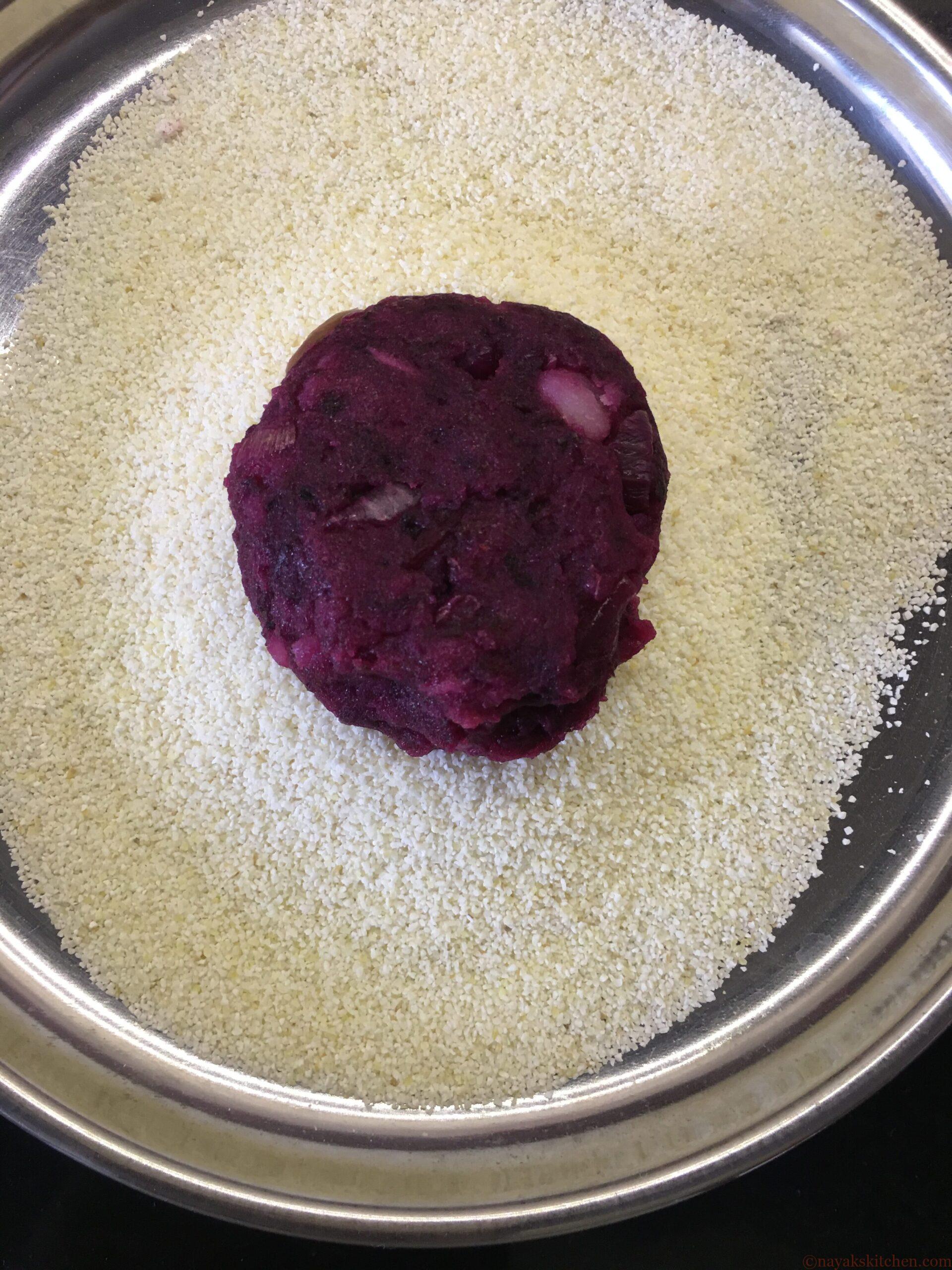 Coating beetroot cutlet with rava