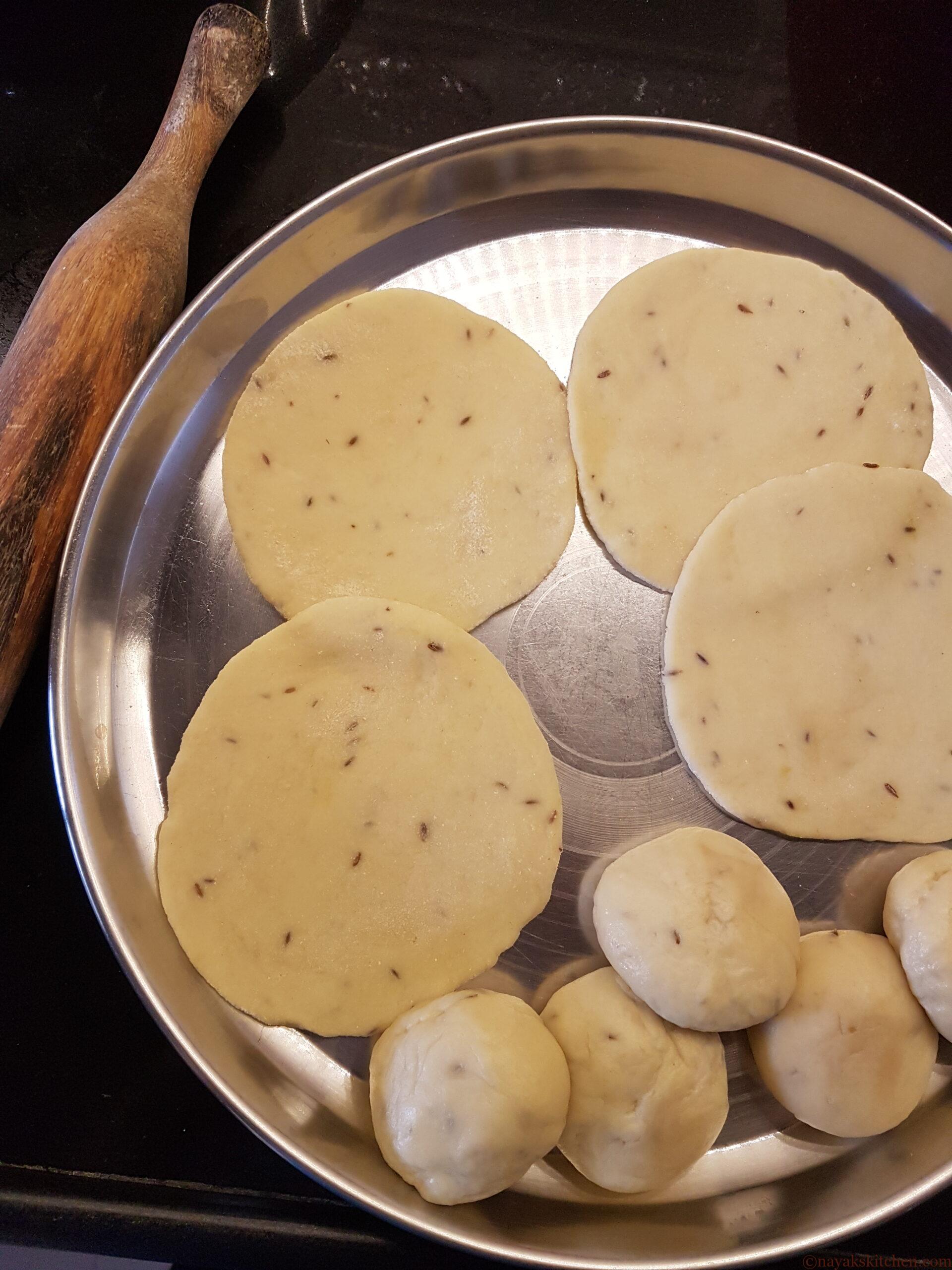 Rolling buns into puri shape