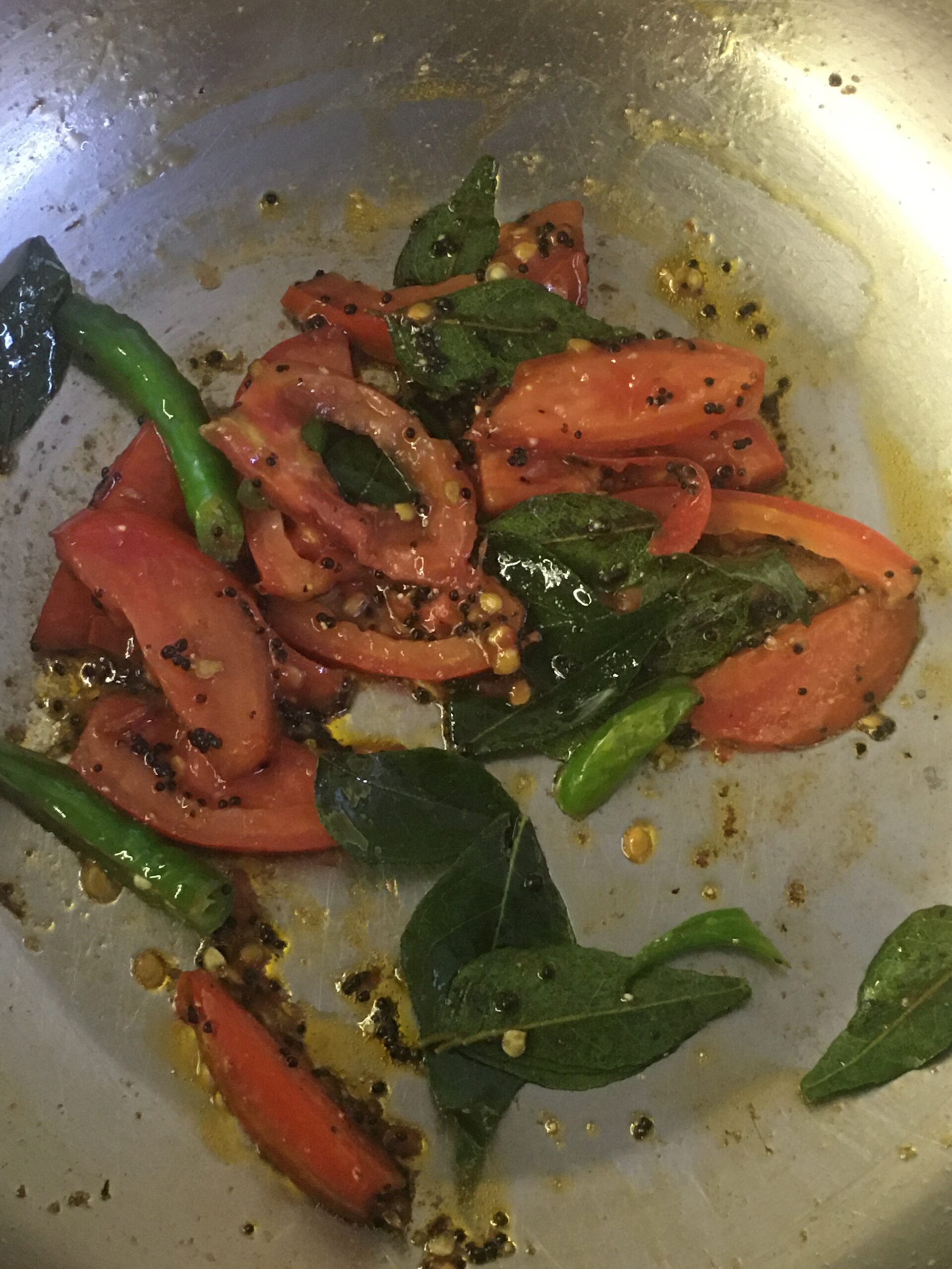 Cooking till tomatoes are soft