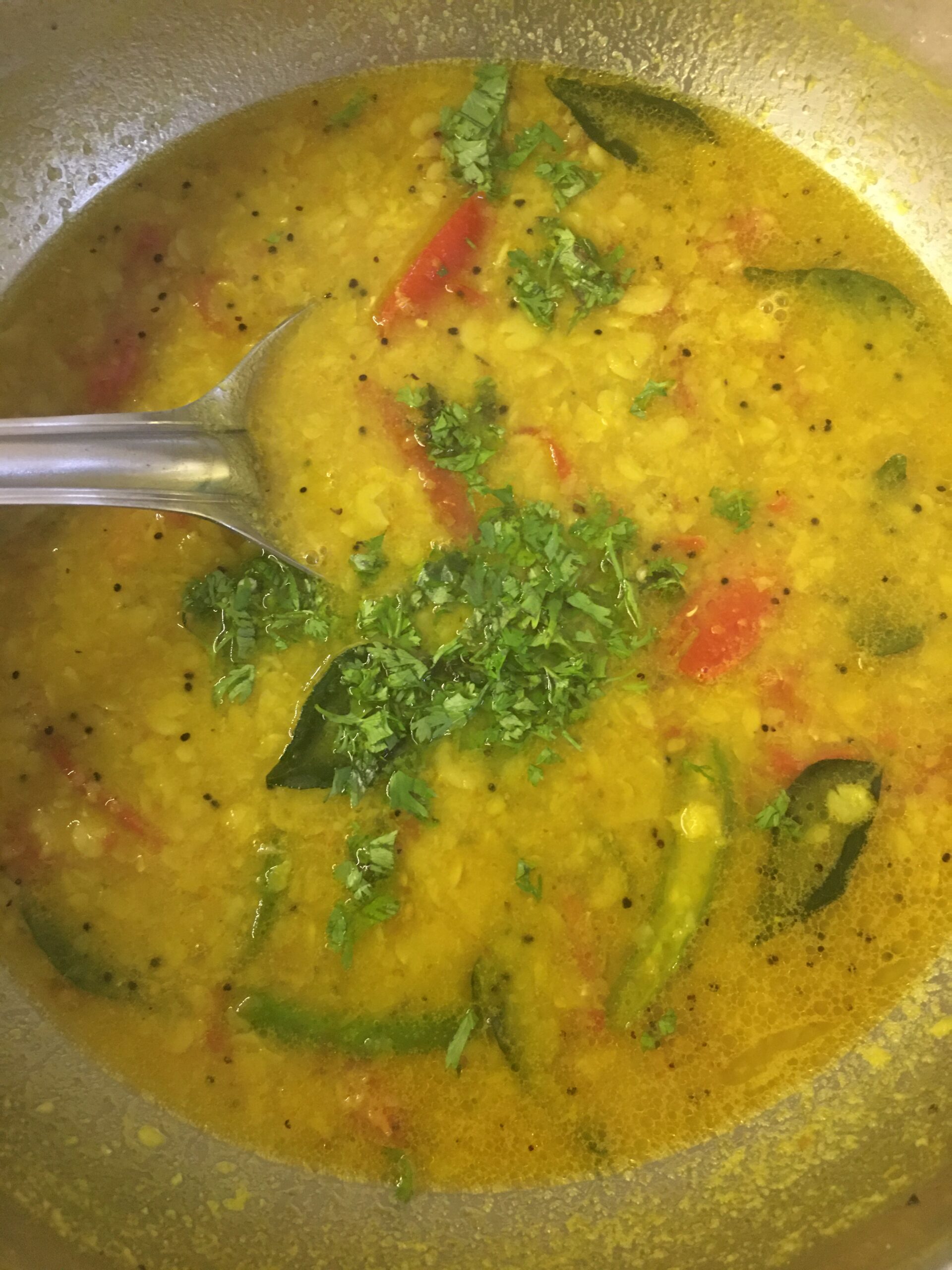 Adding chopped coriander leaves