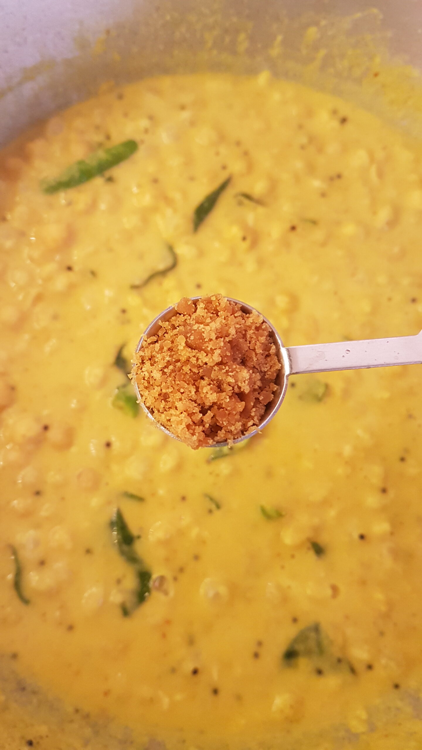 Adding jaggery