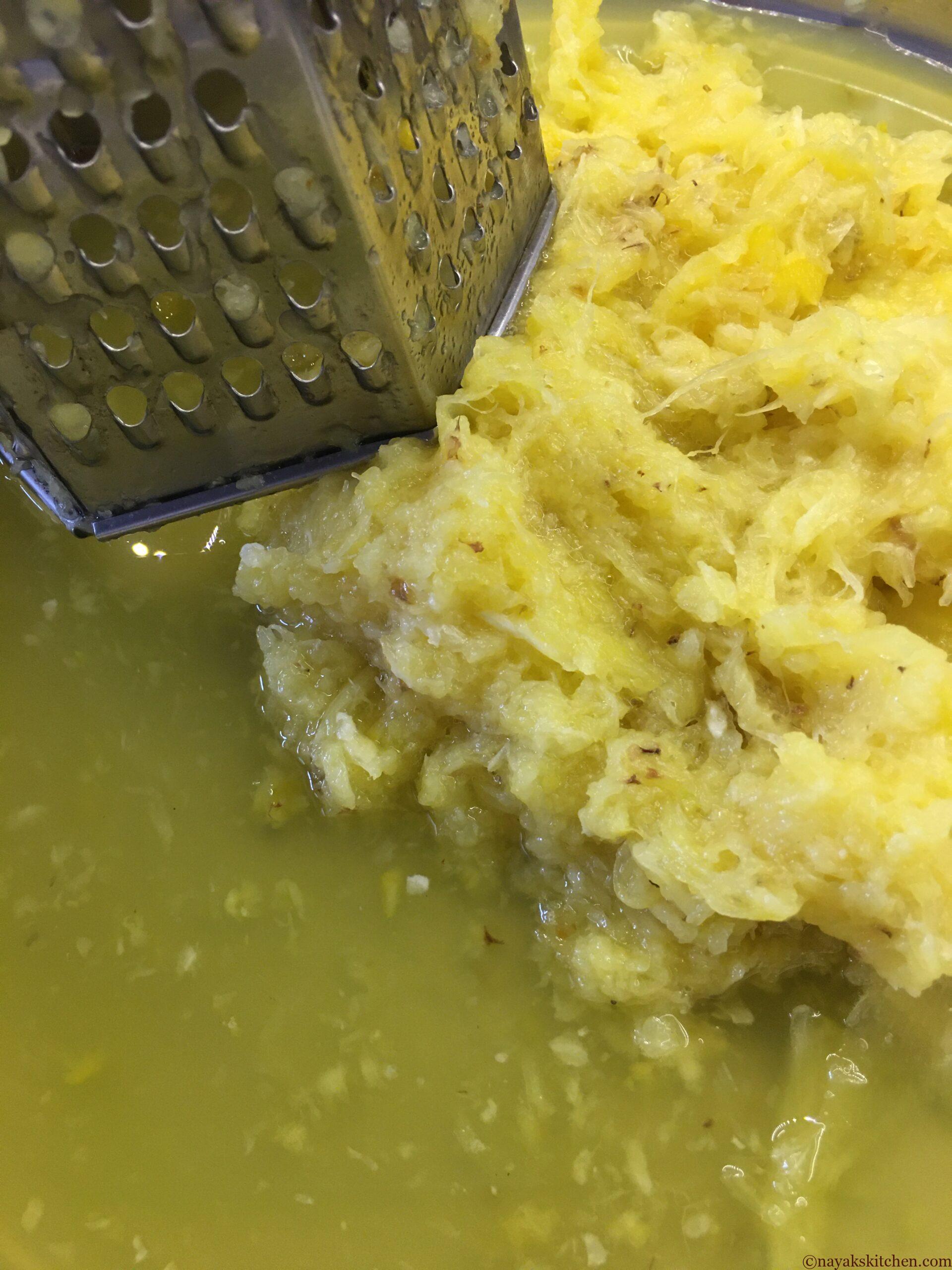 Grating the pineapple
