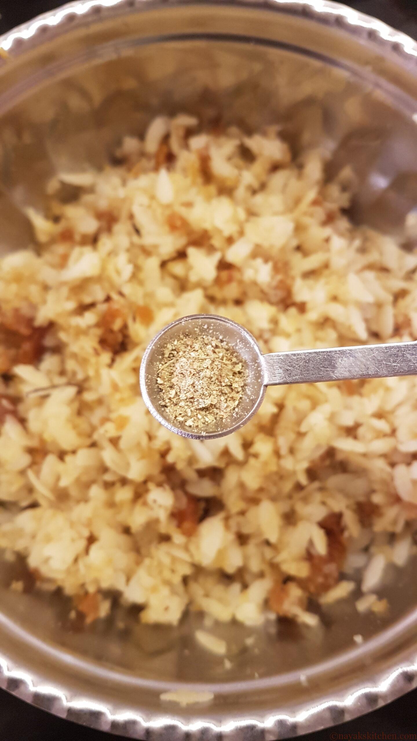 Adding cardamom powder