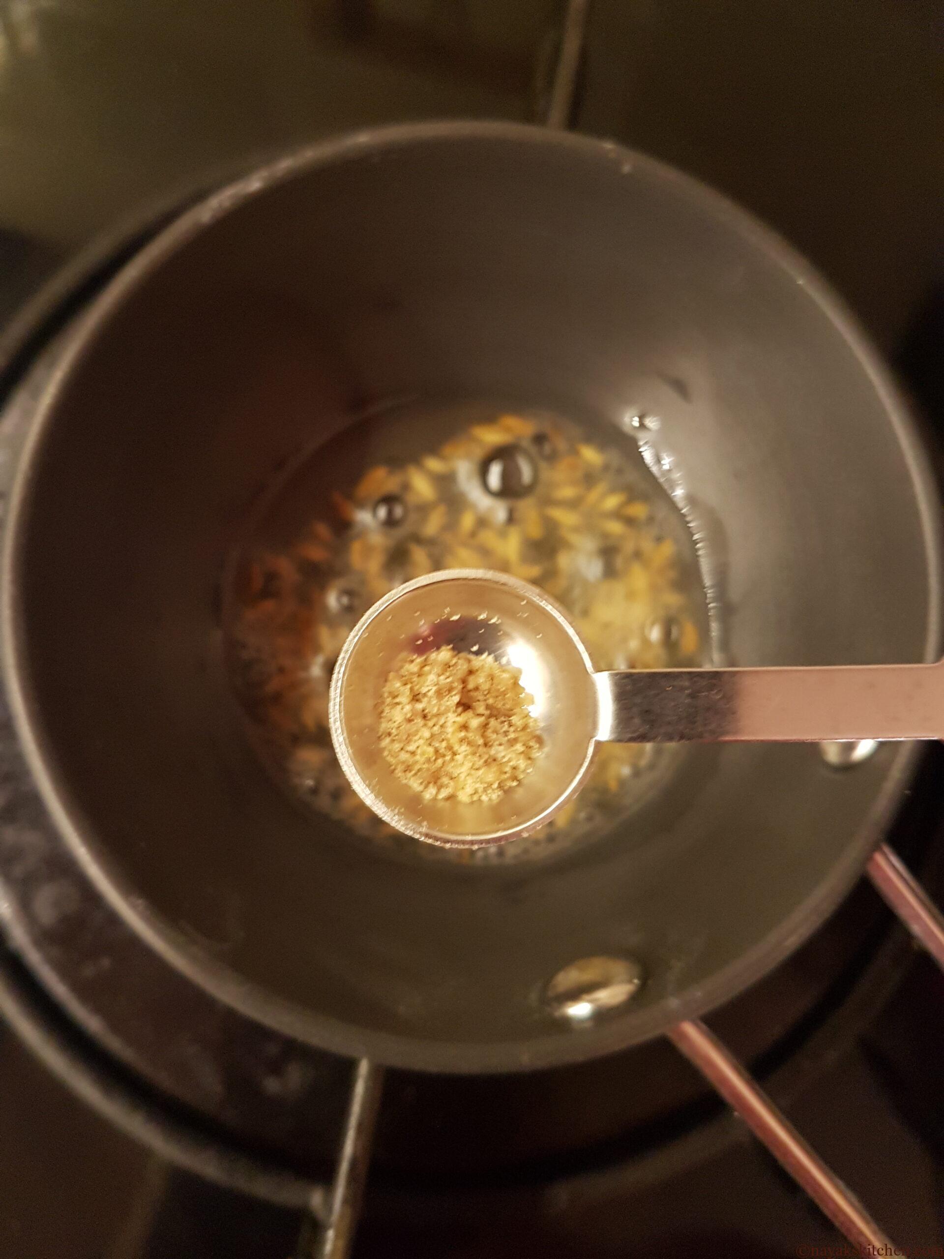 Adding asafoetida