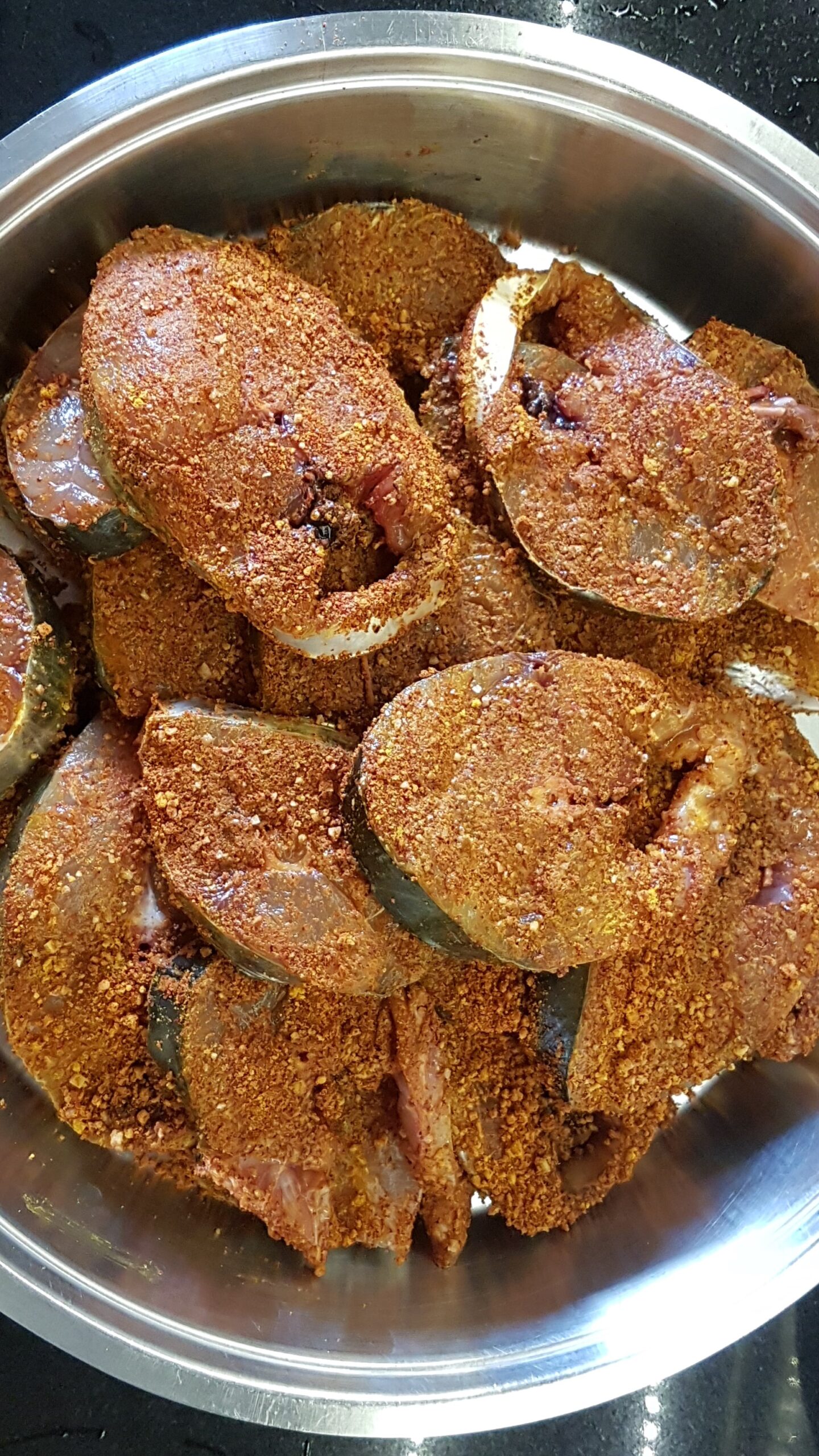 Fish coated with spices
