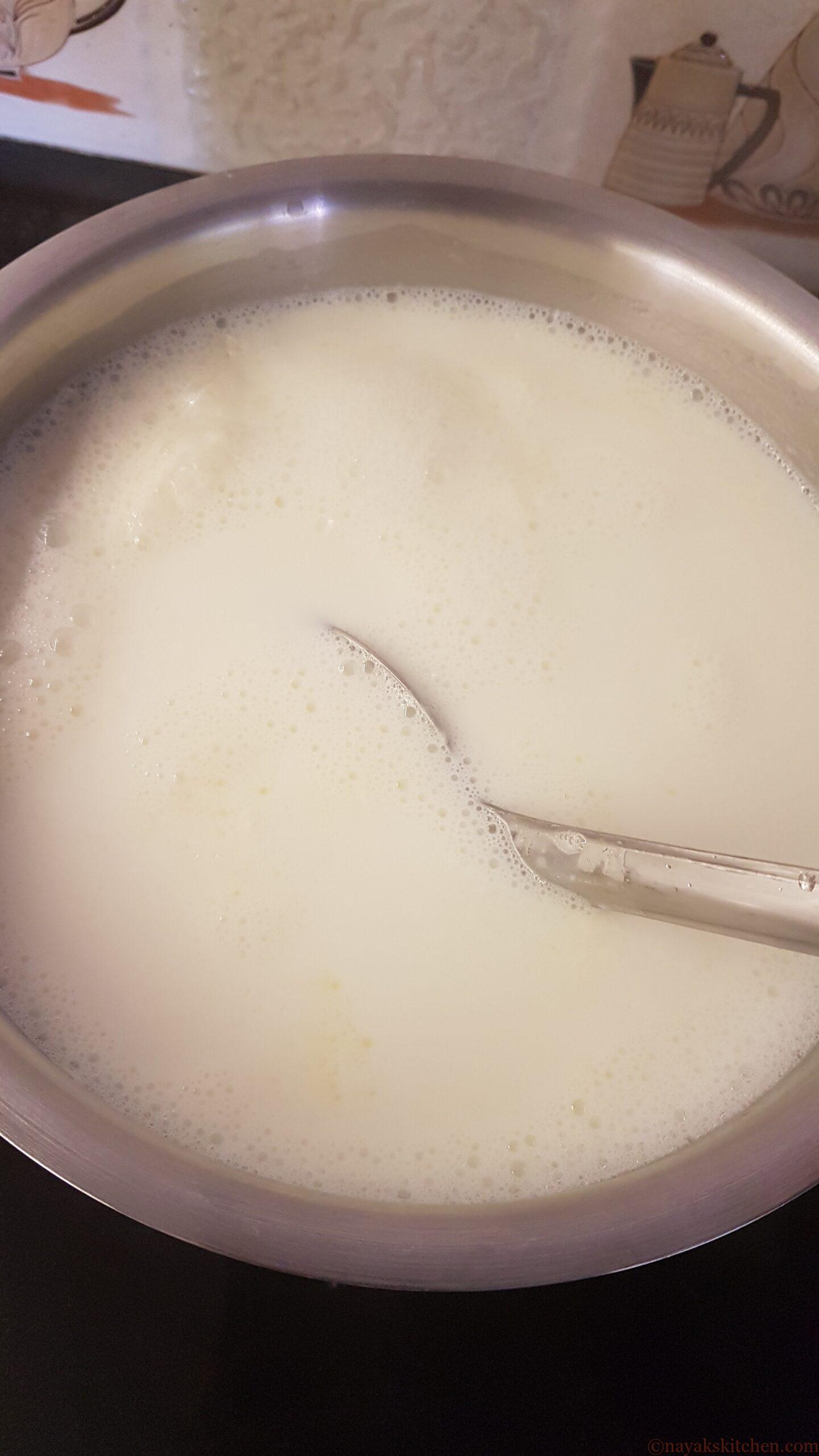 Stirring milk to prevent burning at the bottom