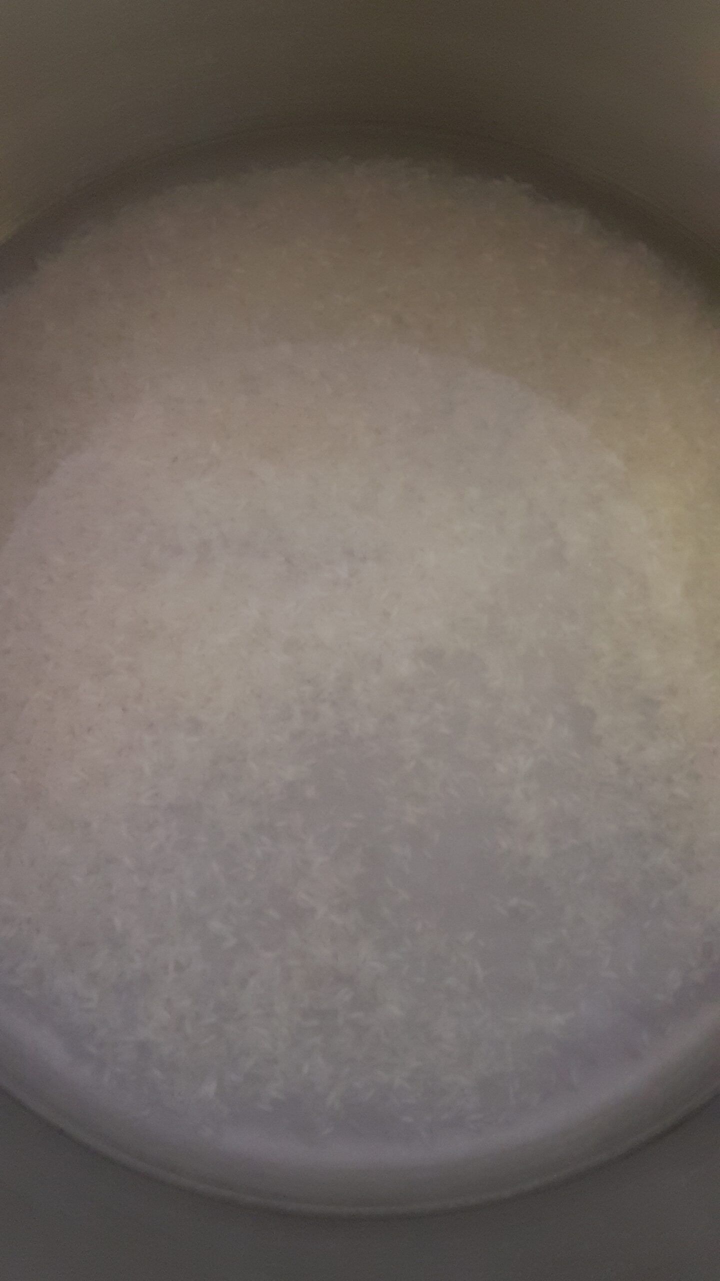 Adding water to cook rice