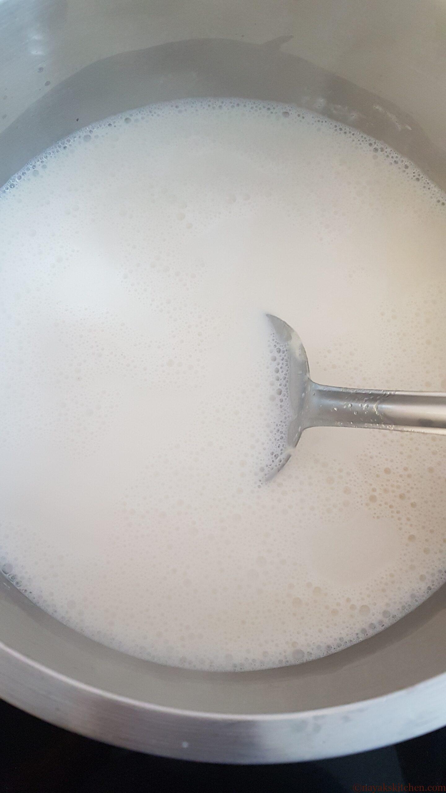 Stirring rice payasam in between