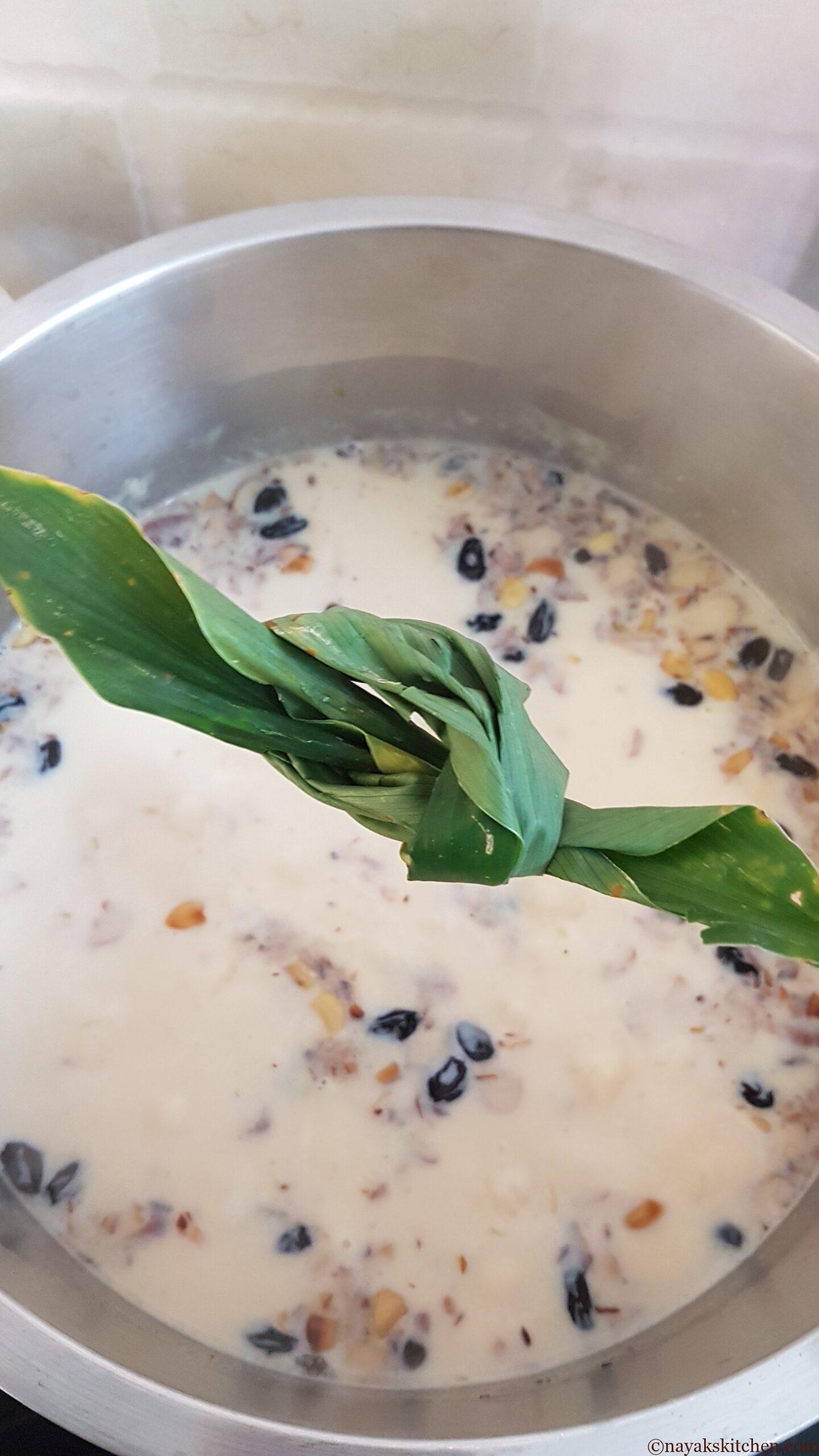 Adding turmeric leaf