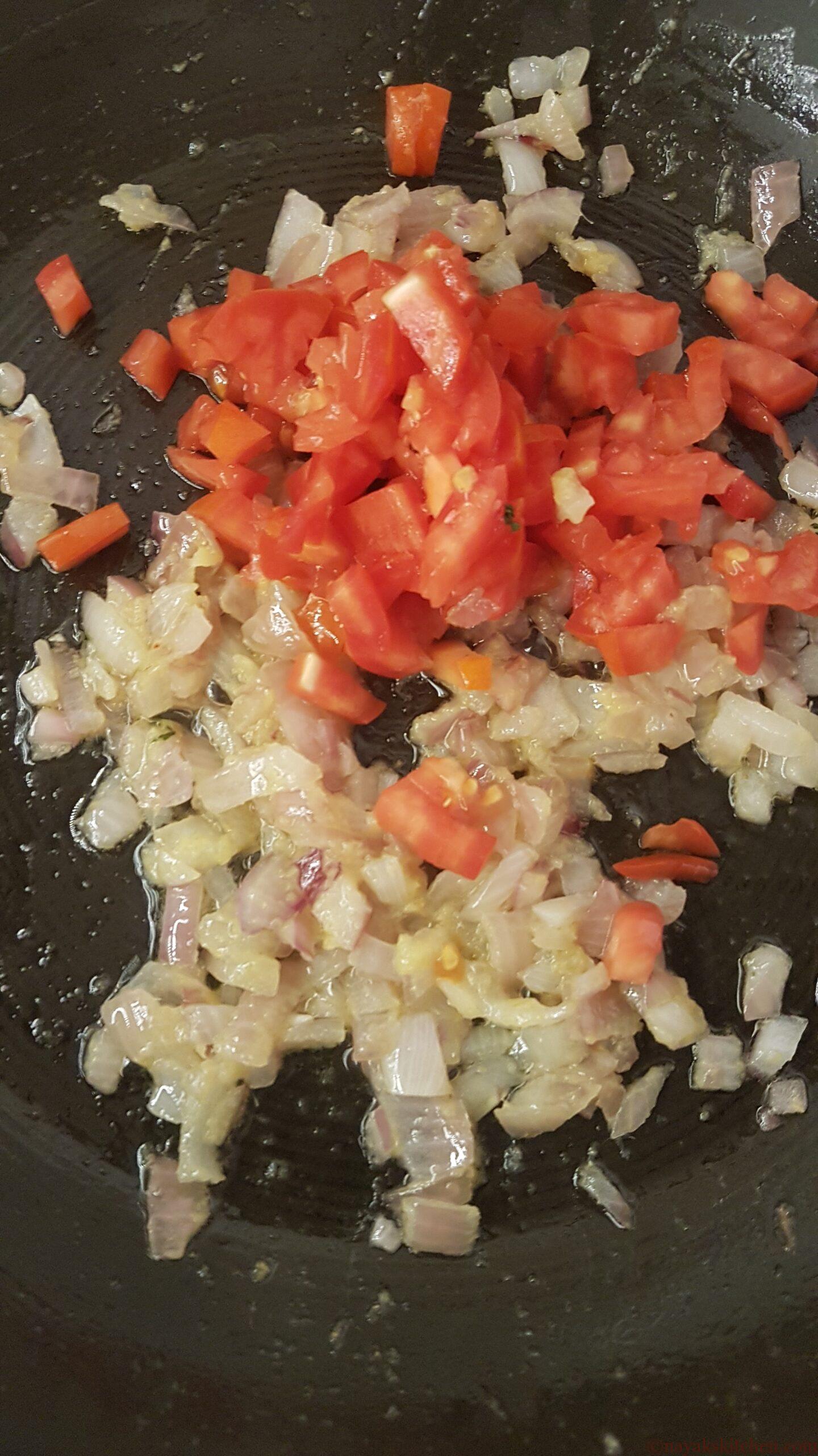 Adding tomatoes