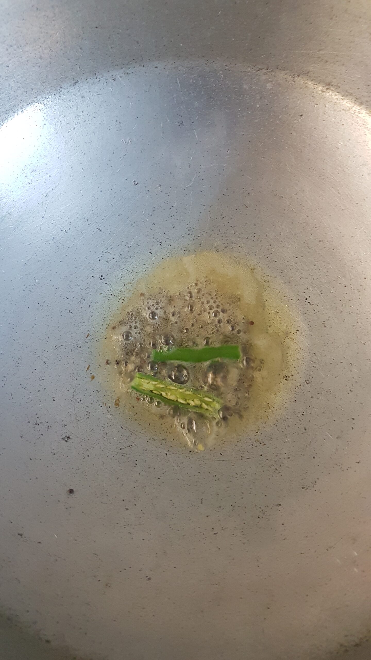 Adding slit green chilli