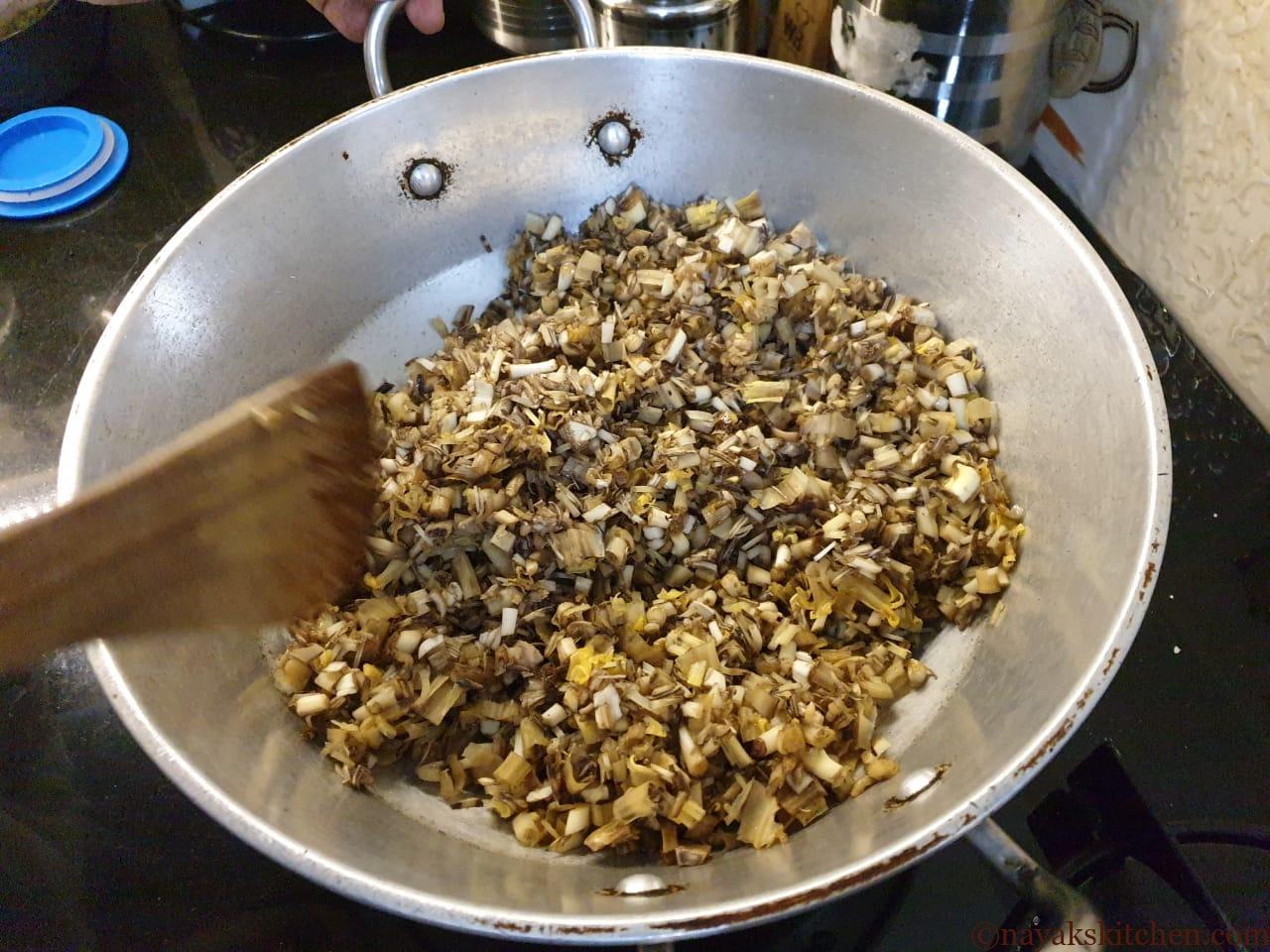 Sautéing Kelfulachi bhaji