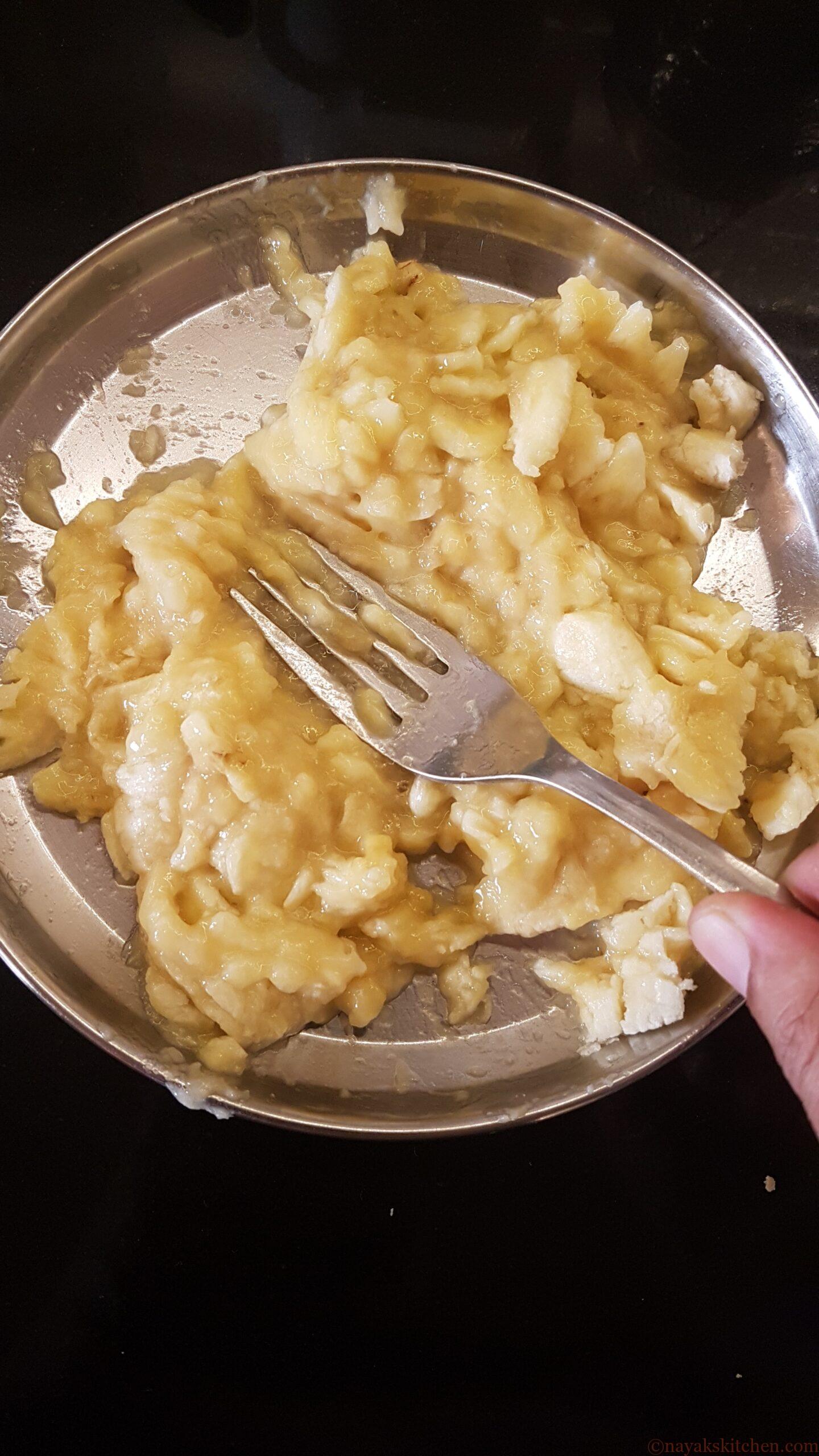 Mashing the bananas with a fork