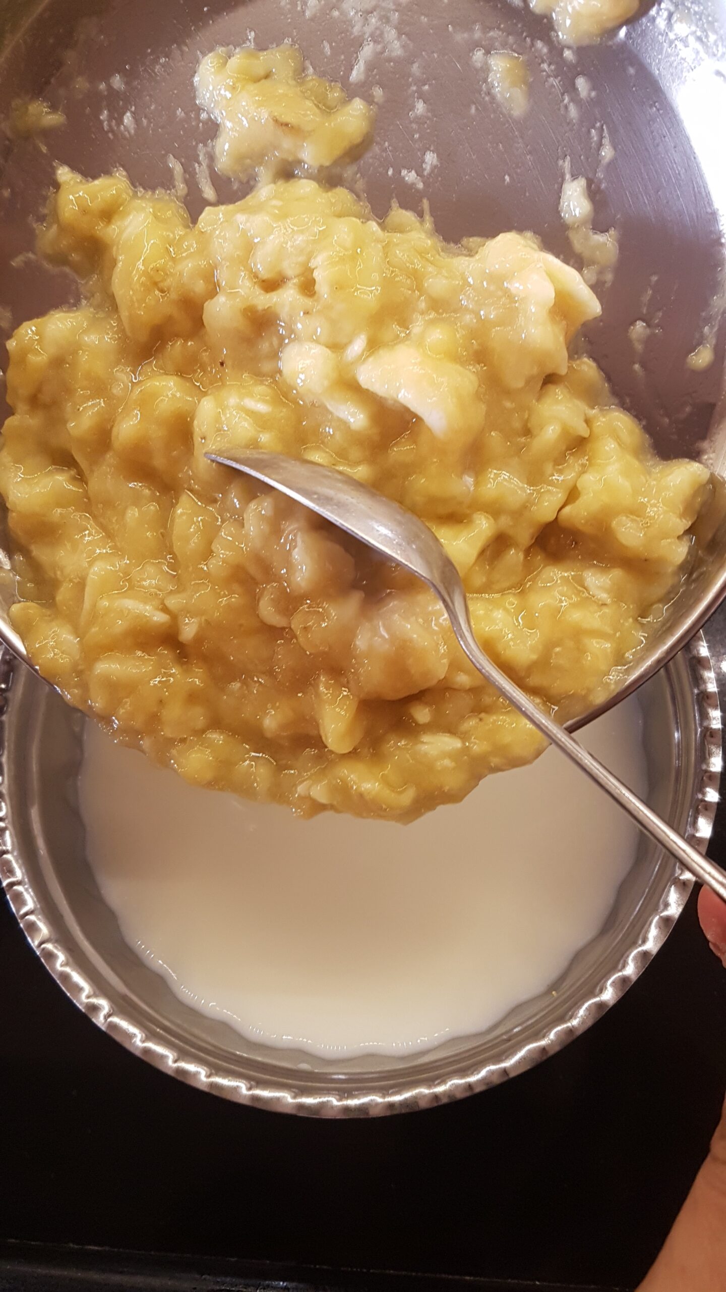 Adding mashed banana to milk