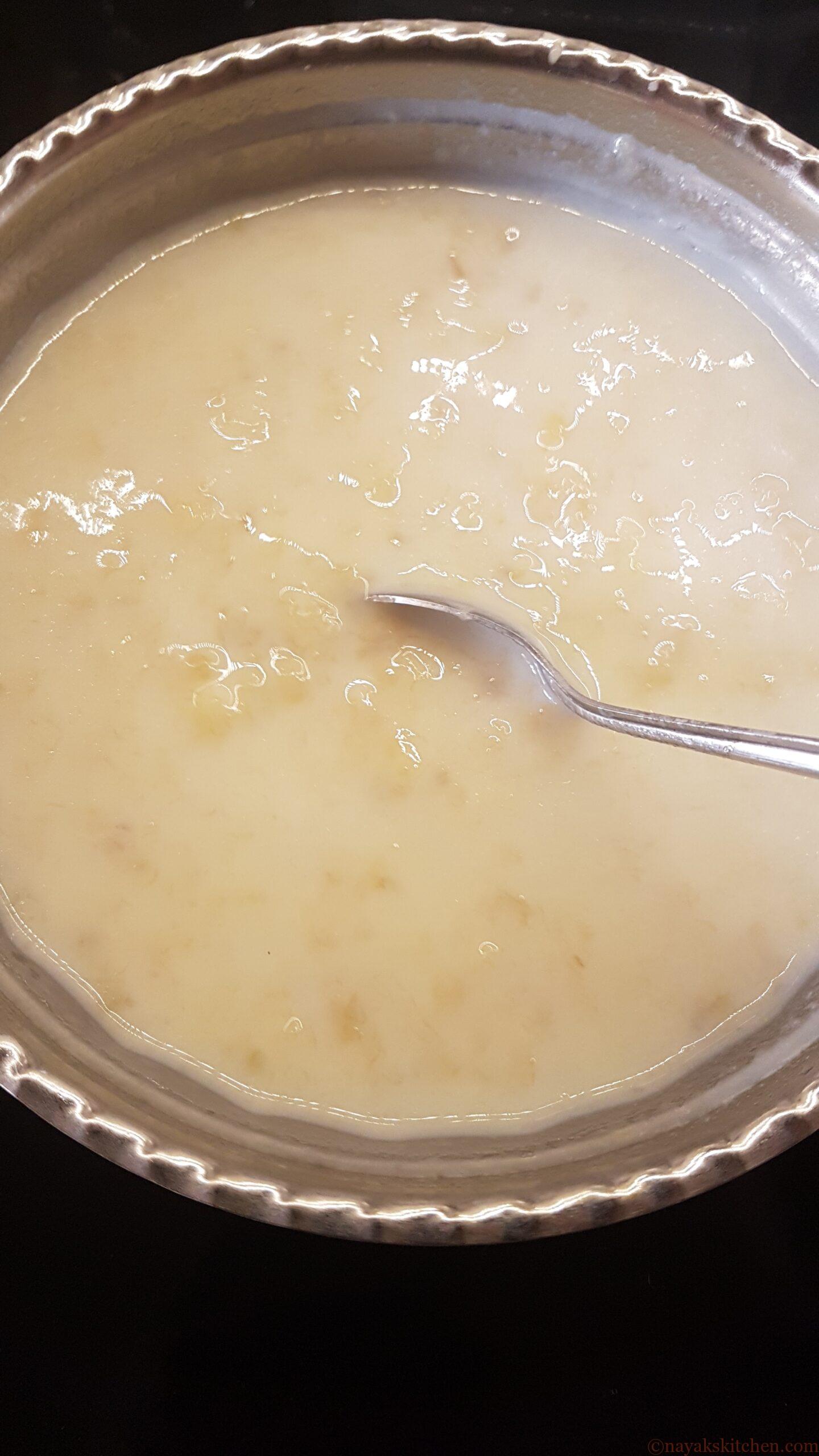 Mixing milk, sugar and bananas well