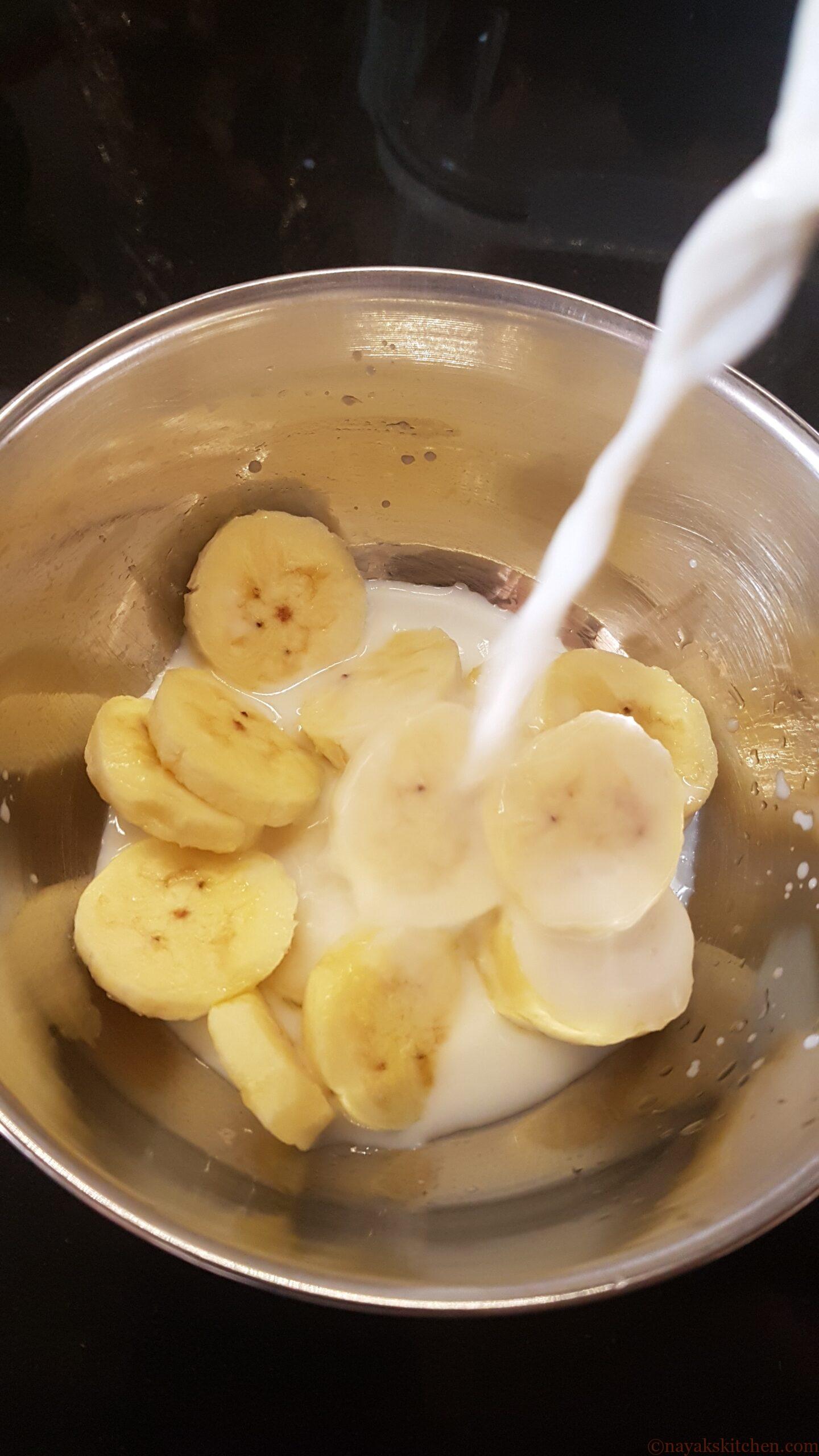 Adding milk to sliced bananas
