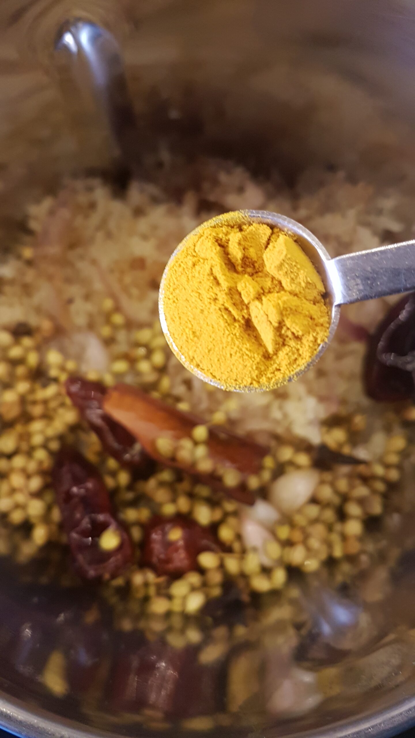 Adding turmeric powder