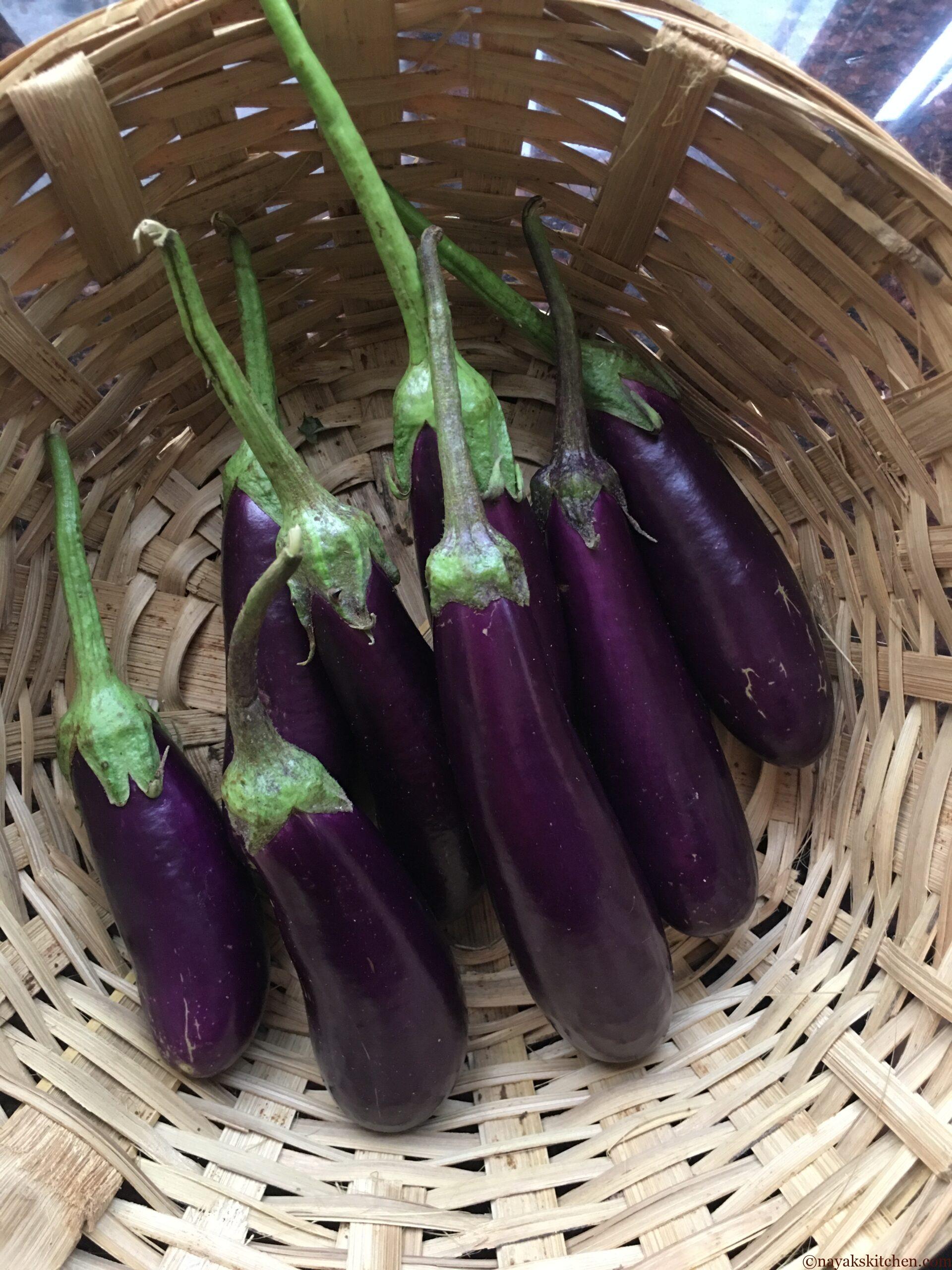 Fresh brinjals in a basket