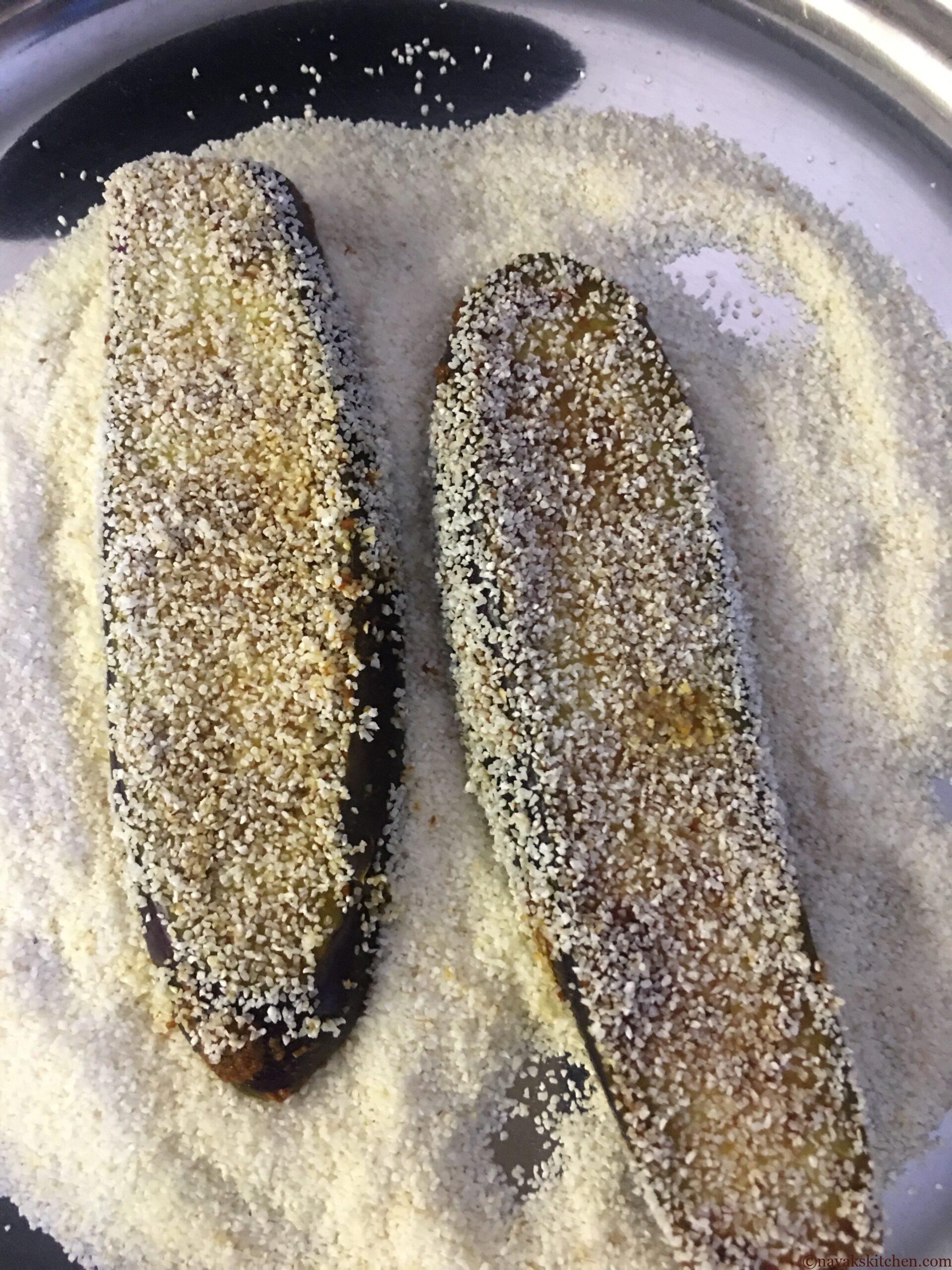 Coating brinjal with rava on all sides