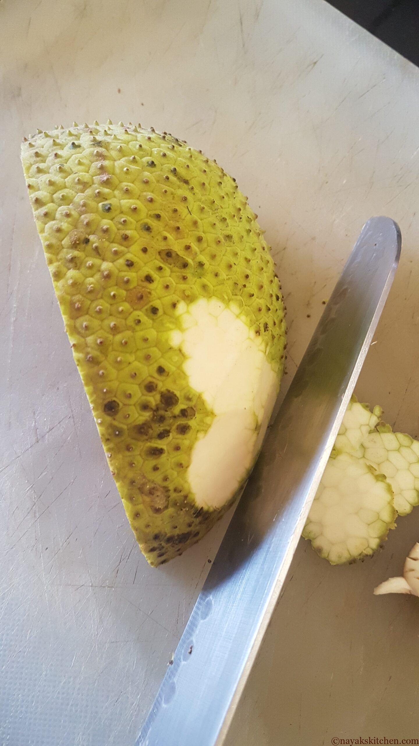 Peeling off the outer skin with a knife