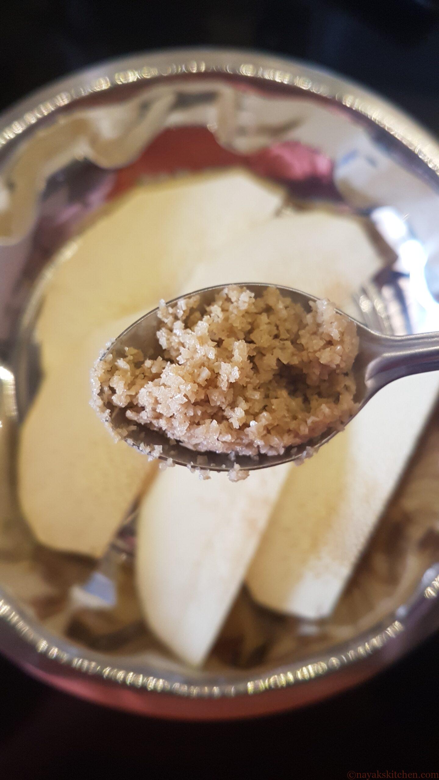 Adding salt to breadfruit pieces