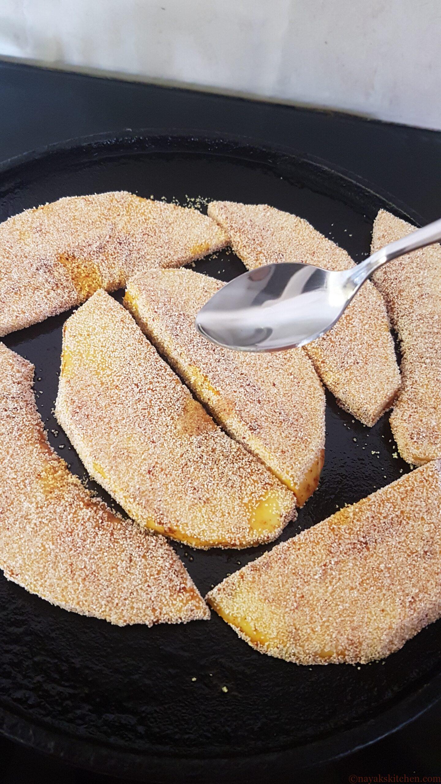 Adding oil along sides of breadfruit