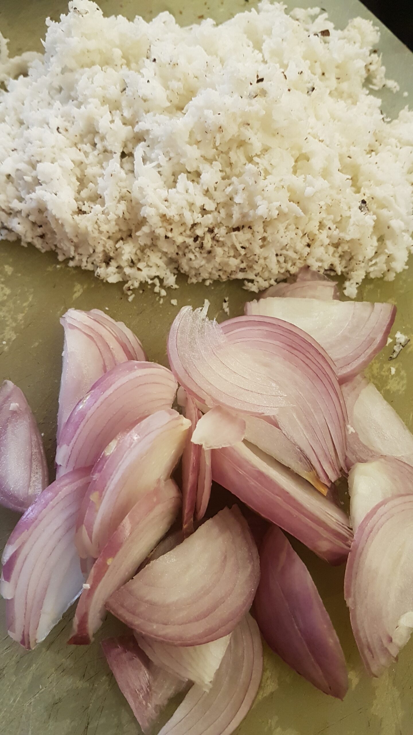 Grated coconut and sliced onion for roasting