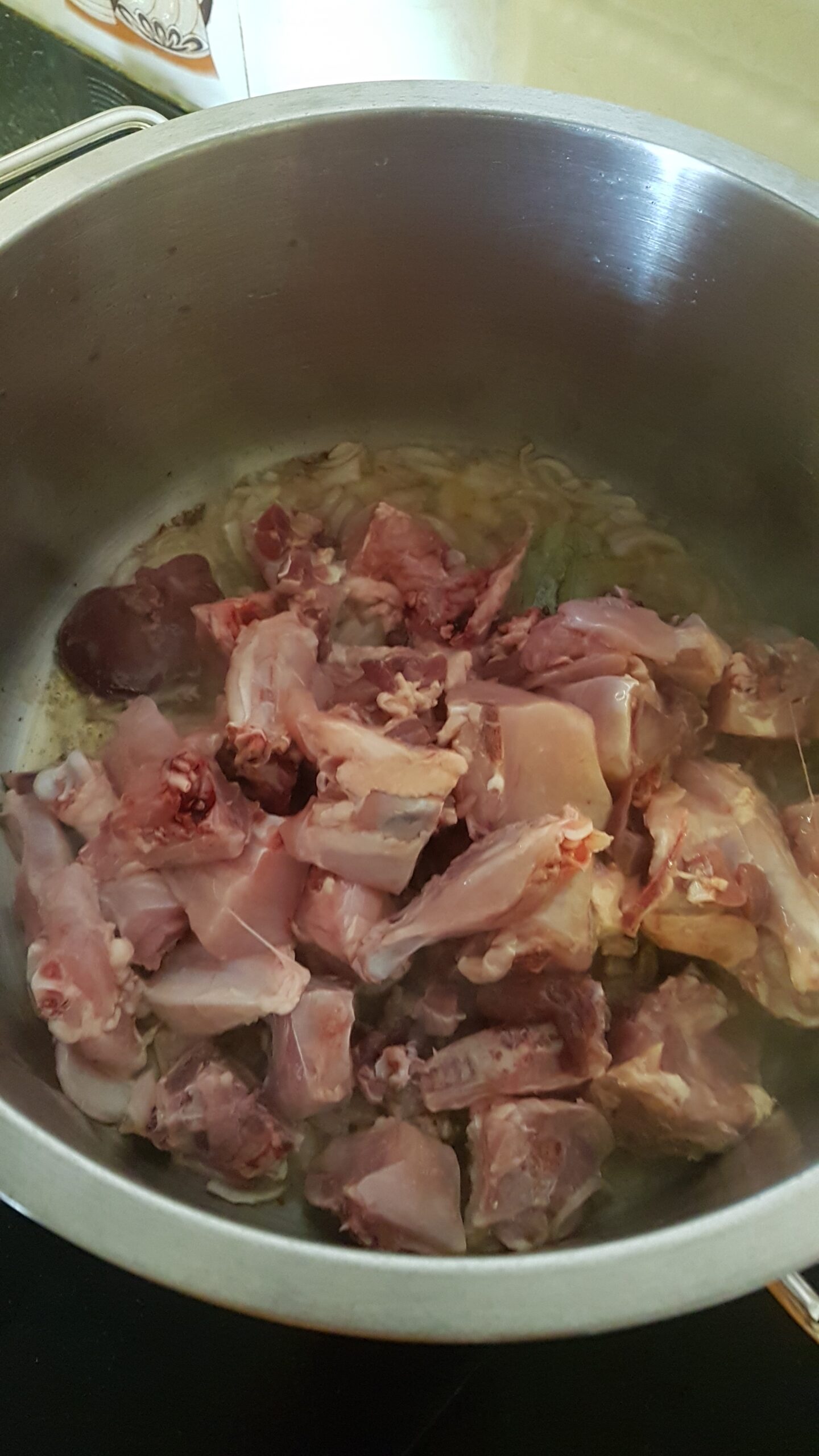 Adding chicken pieces