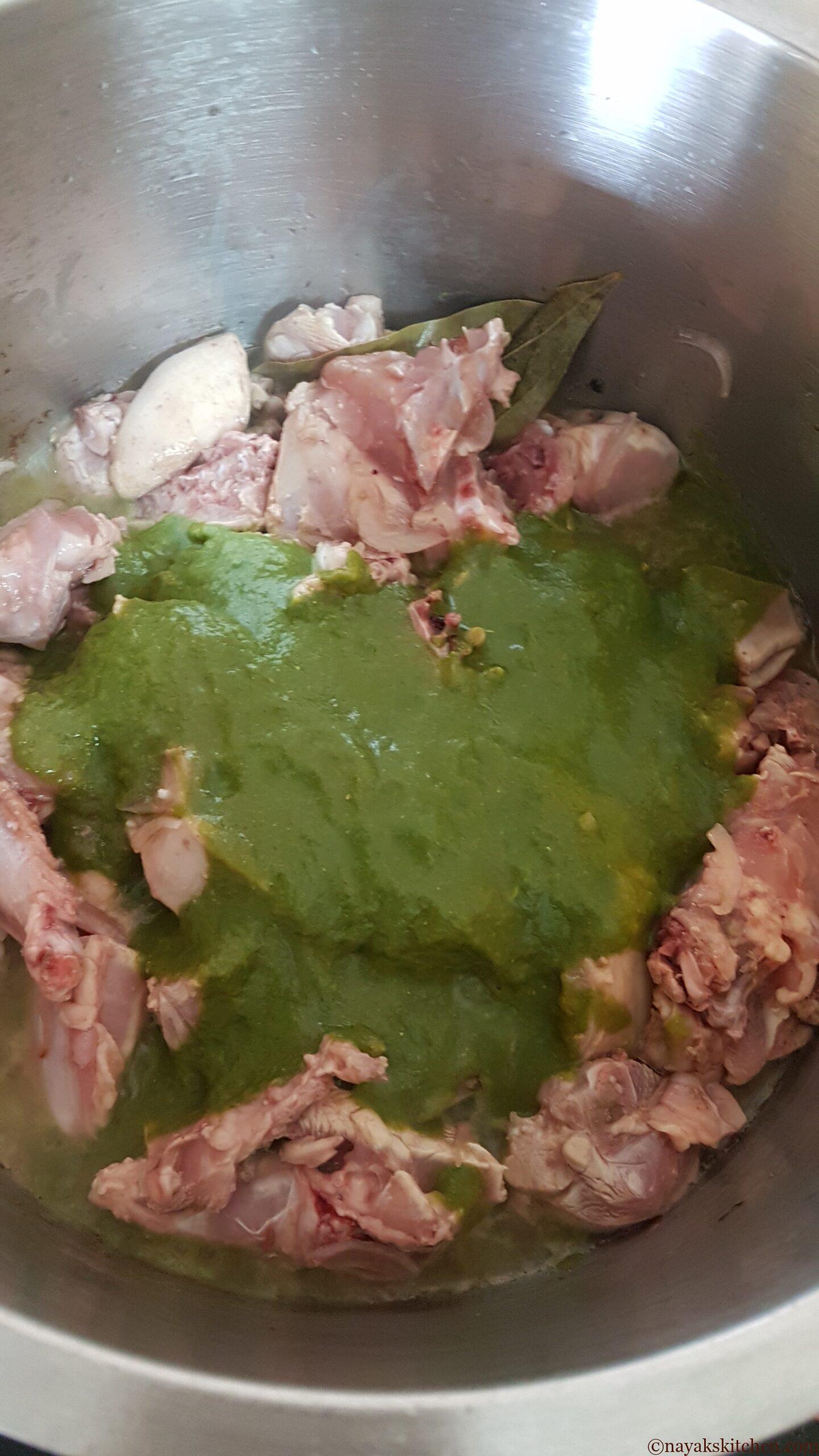 Adding green masala paste
