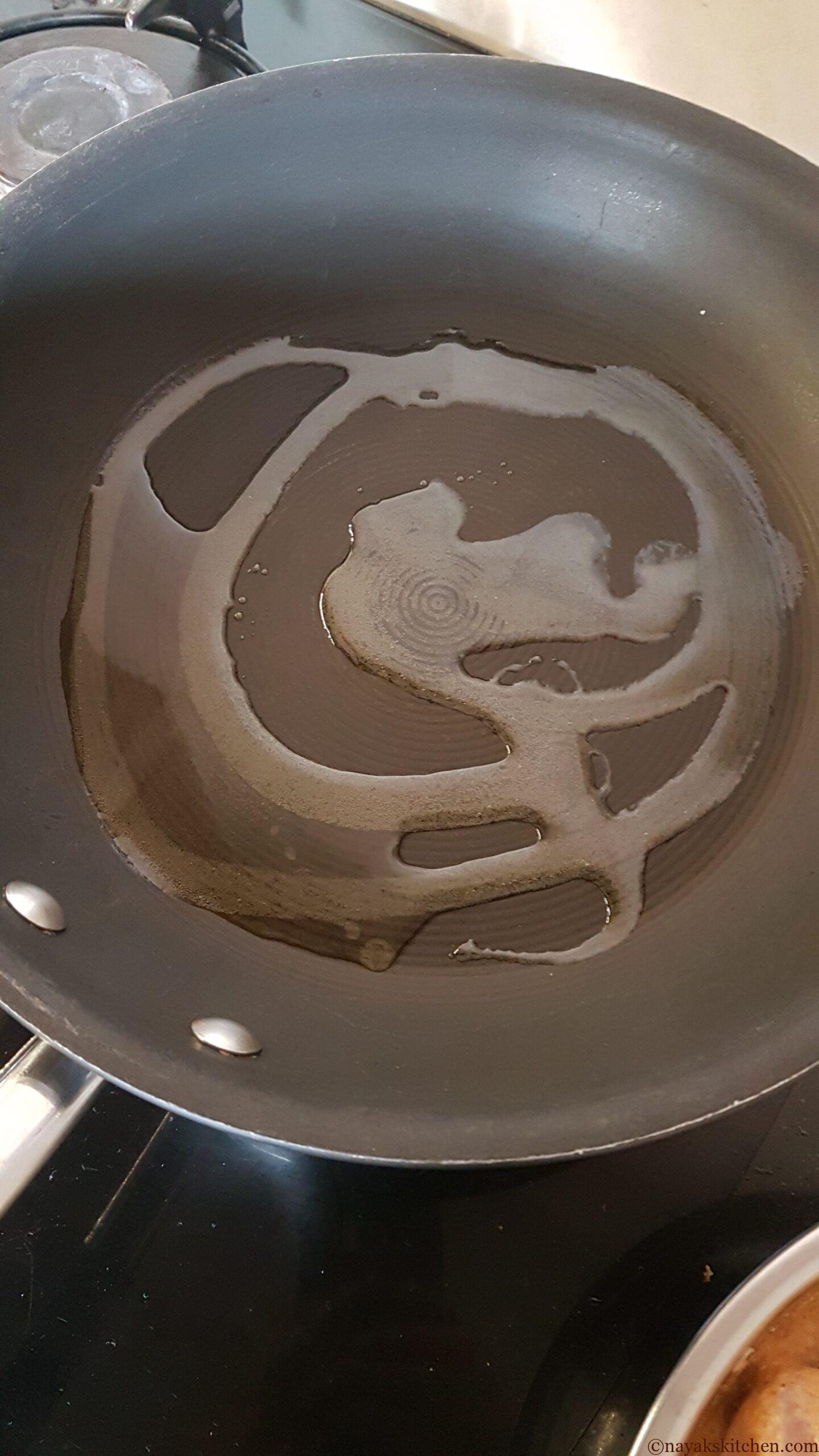 Heat oil in a frying pan
