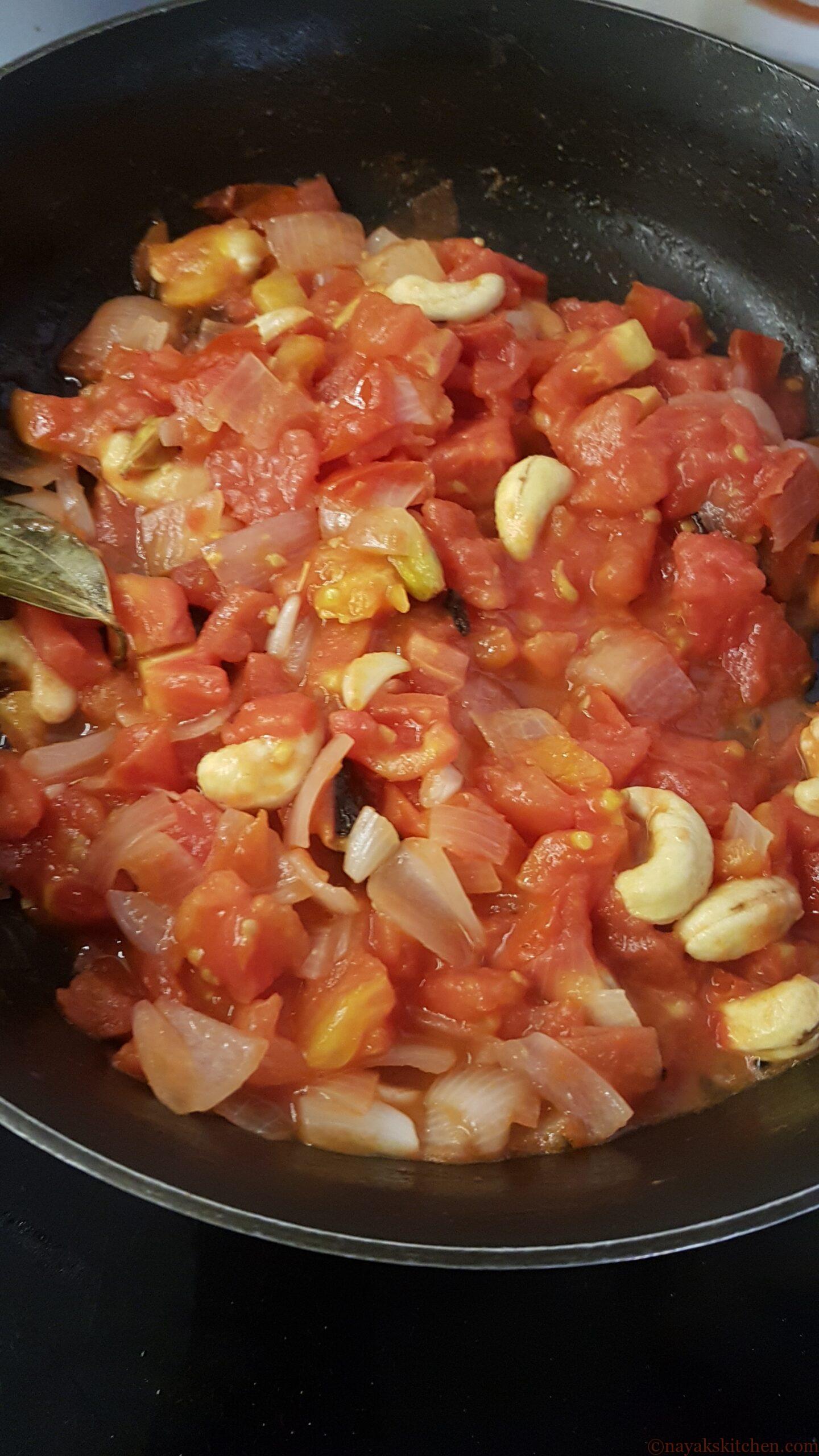 Cook till tomatoes are soft and mushy