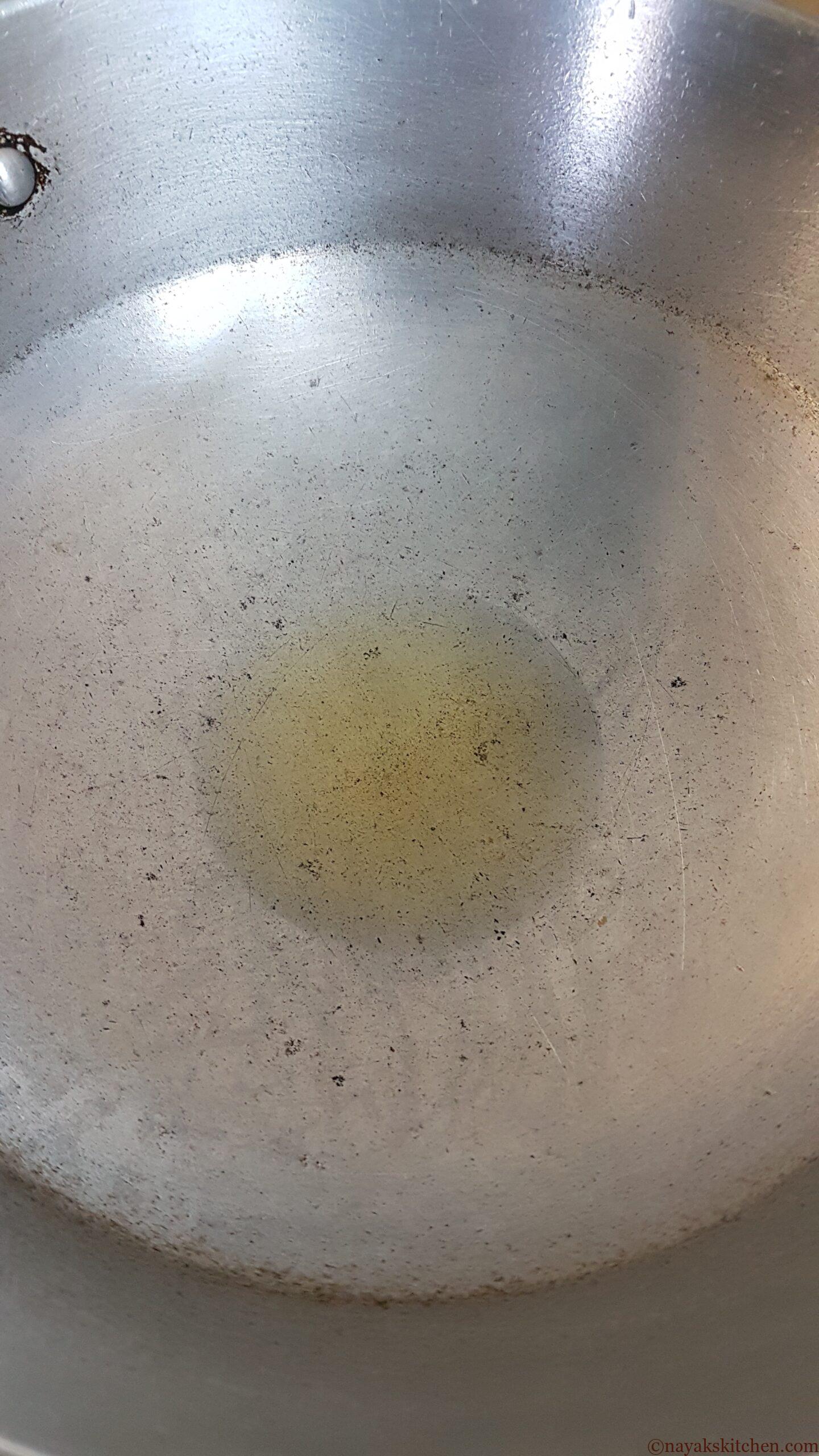 Heat oil for preparing gravy base for butter chicken