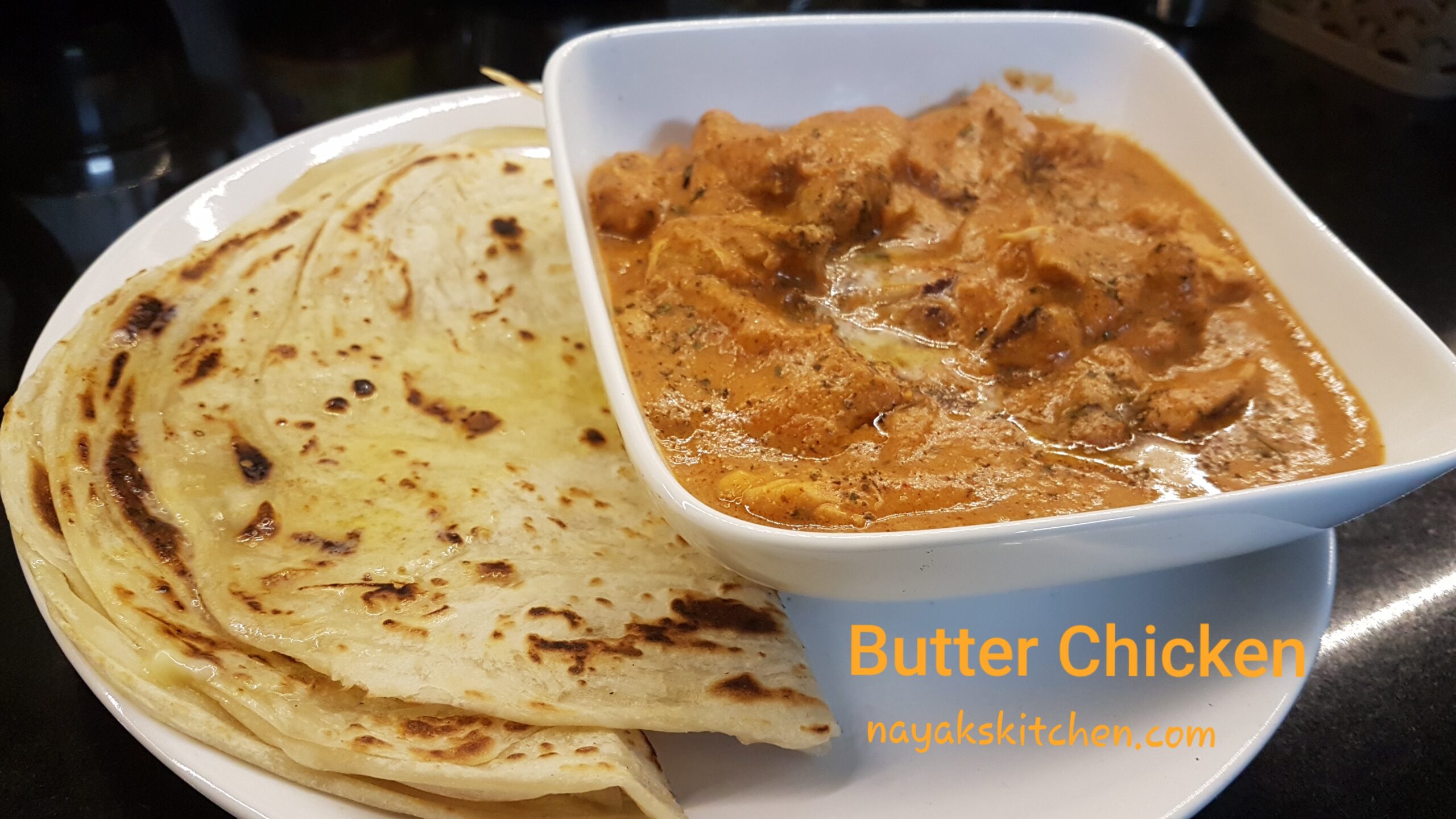 Butter Chicken served with paratha