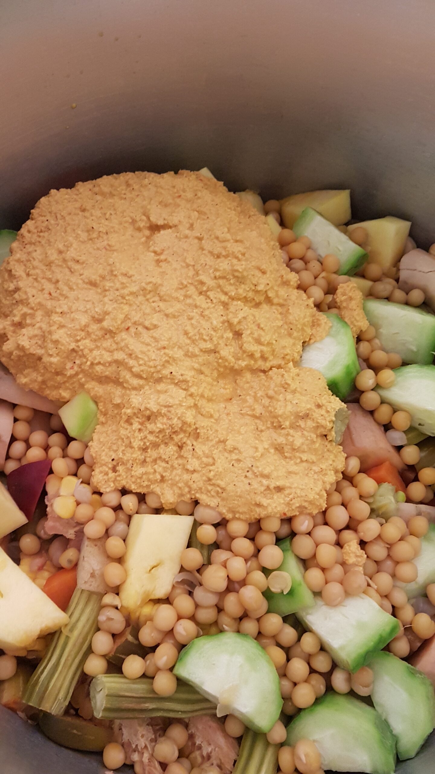 Adding ground coconut paste