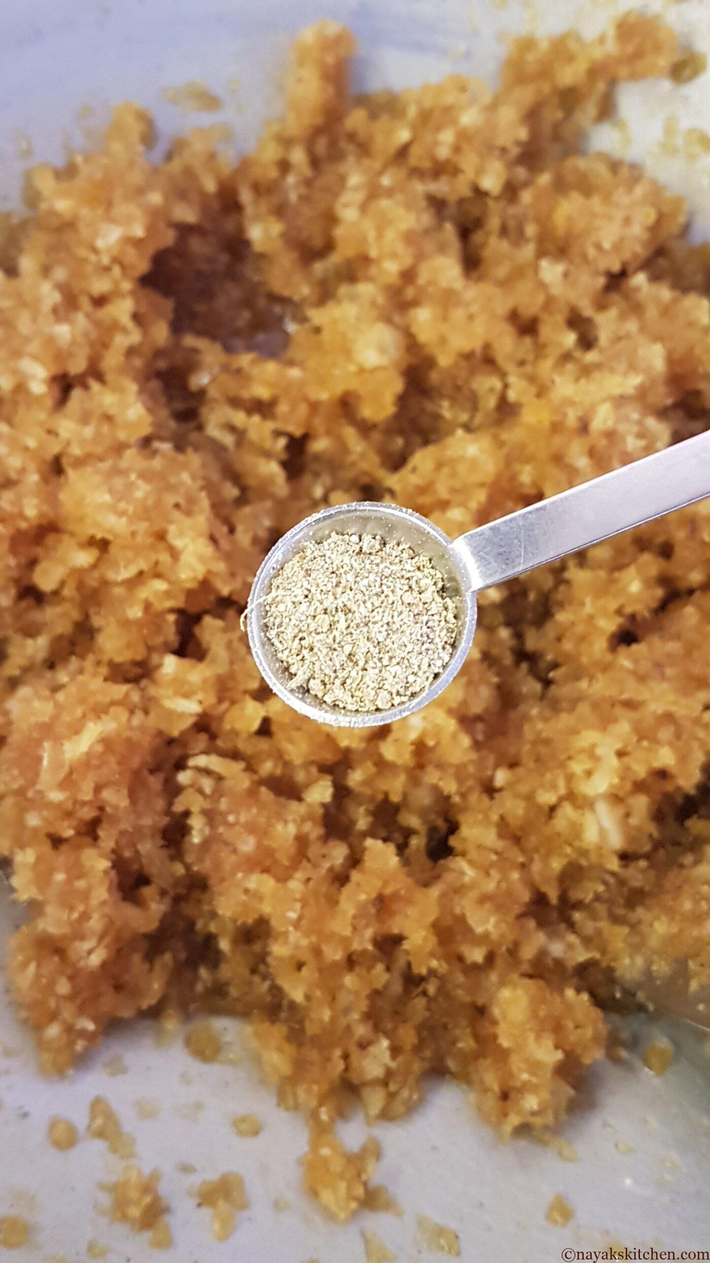 Adding cardamom powder