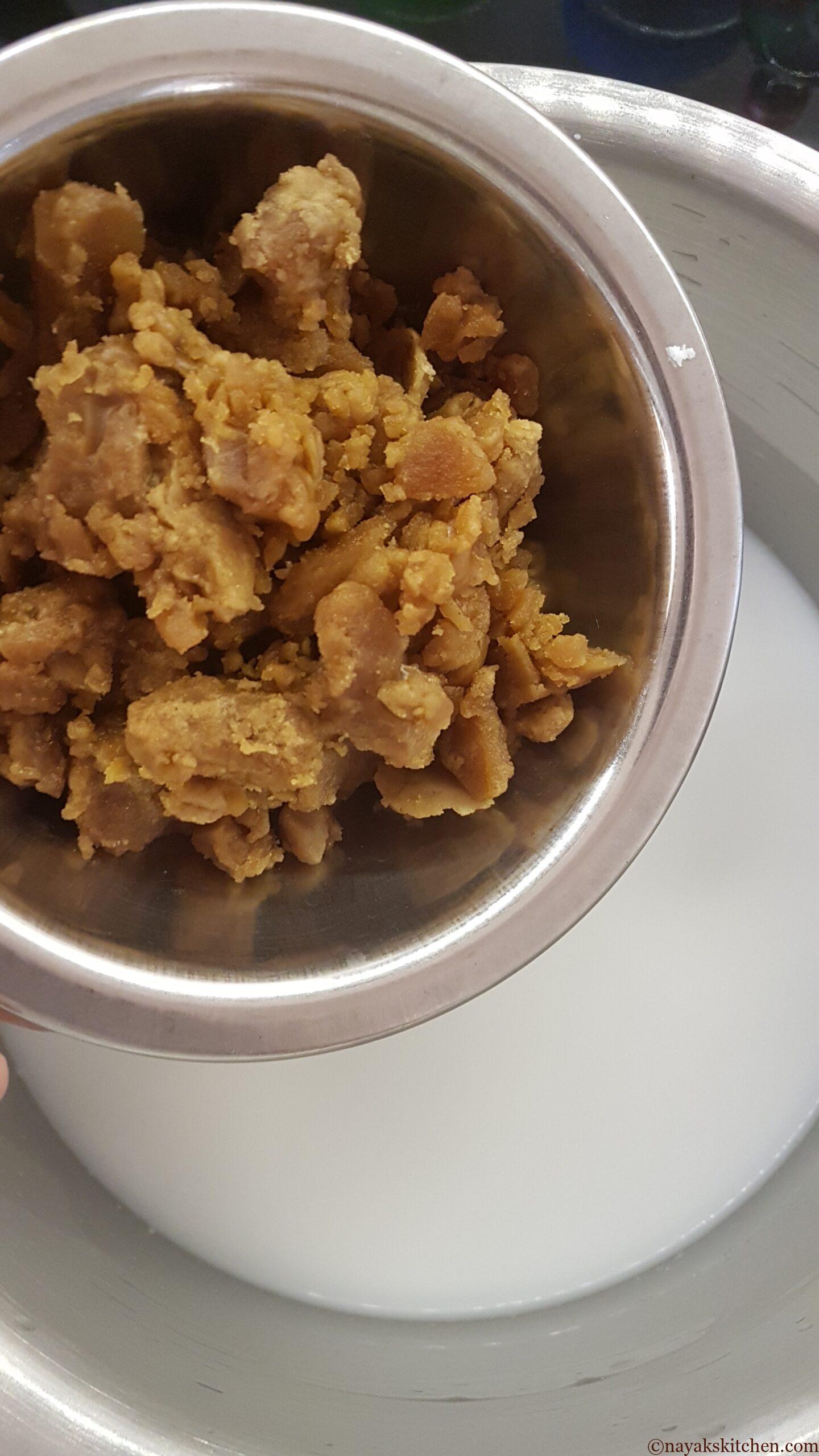 Adding jaggery to thin coconut milk