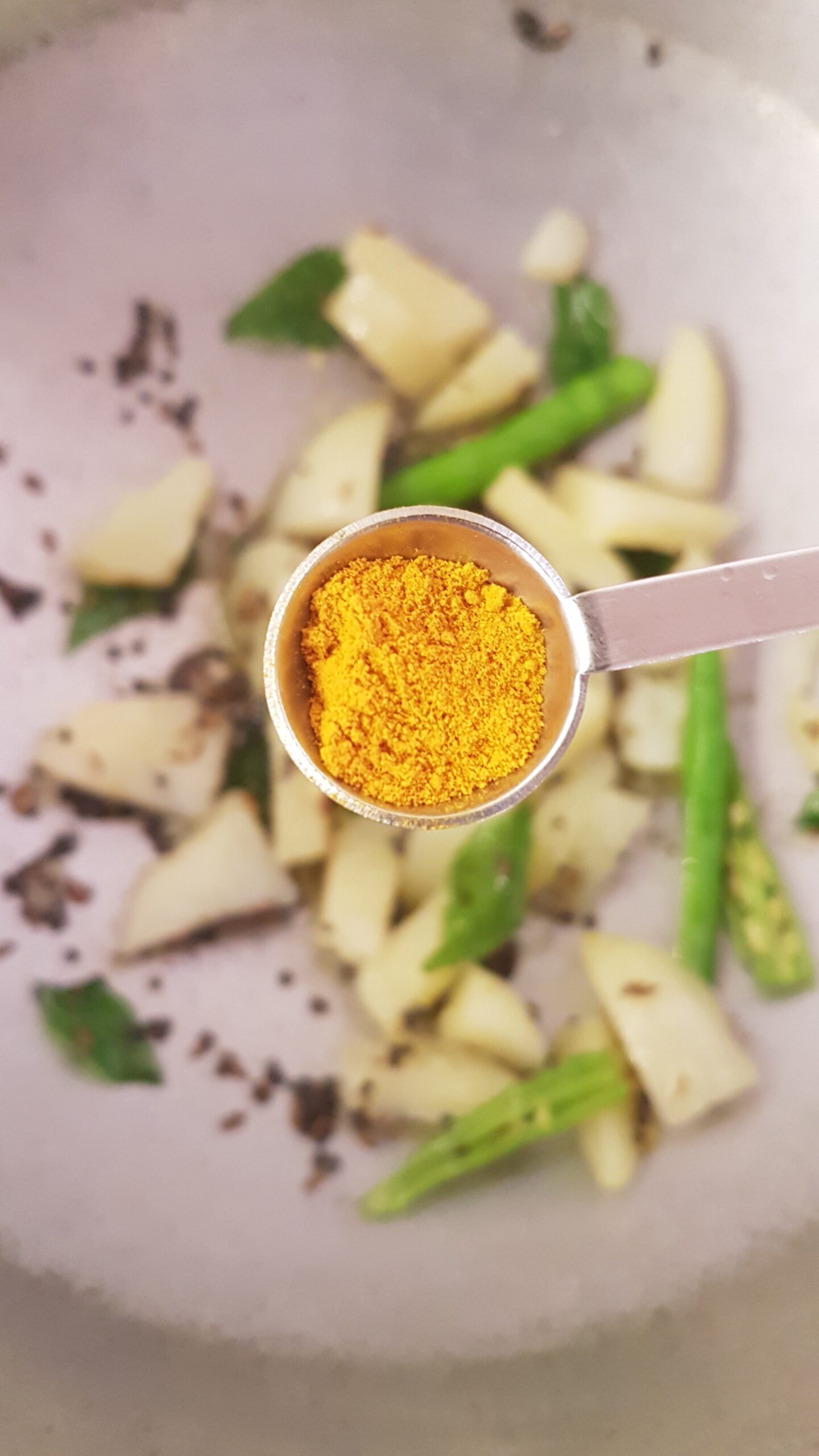 Adding turmeric powder