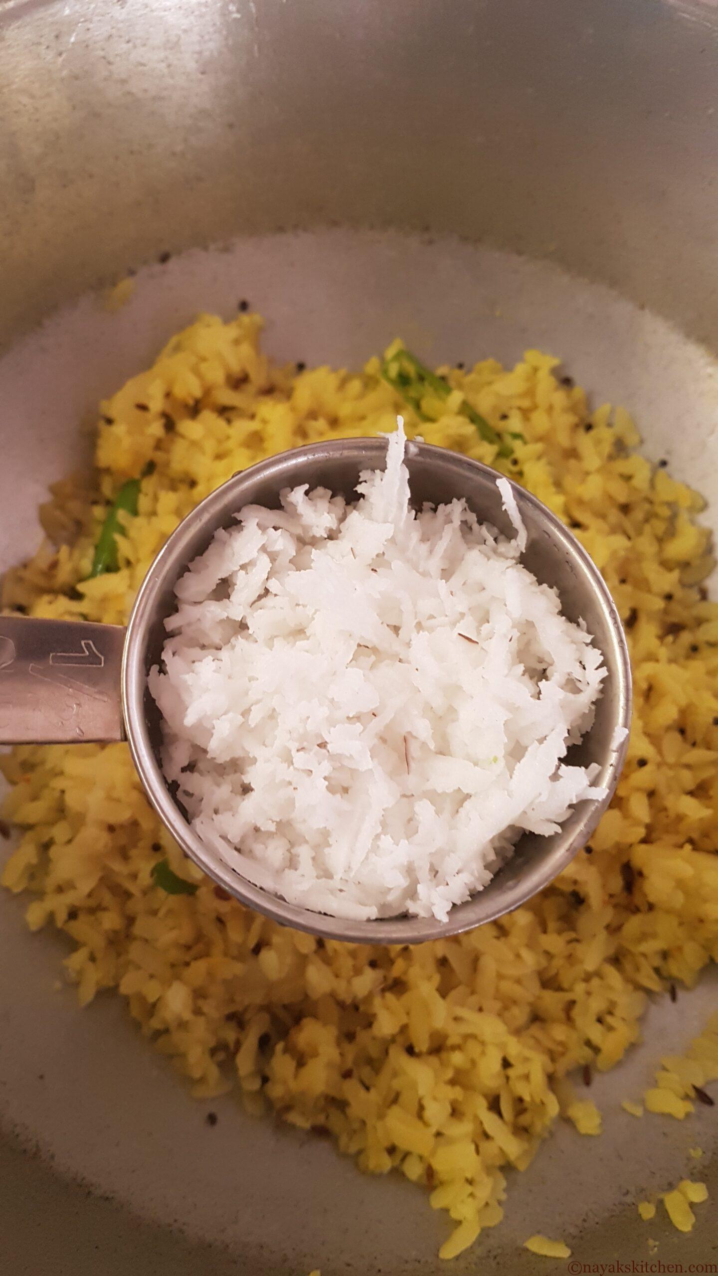Adding grated coconut