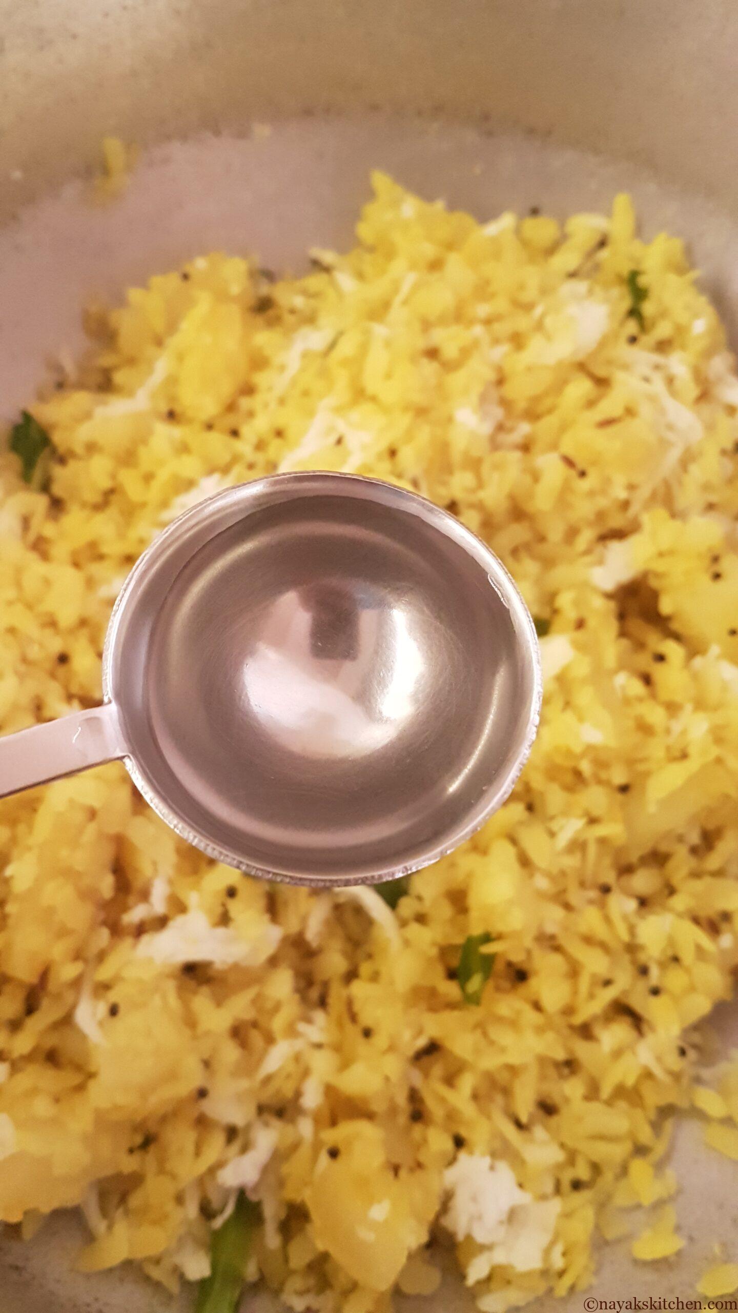 Sprinkling a little water in potato poha