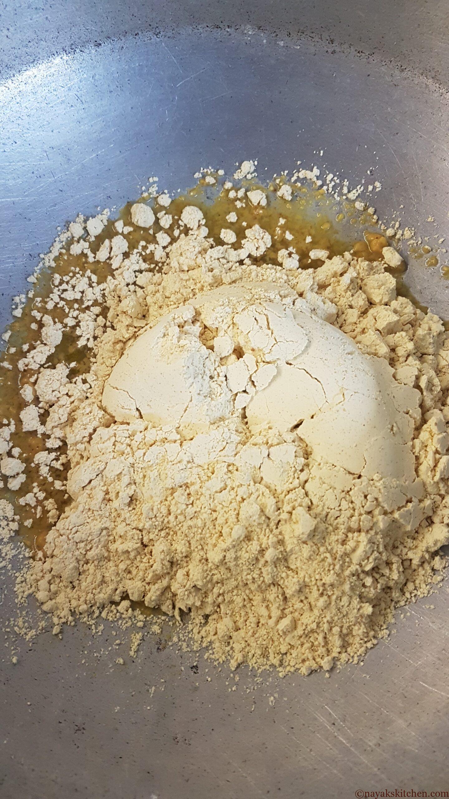 Adding besan flour to ghee