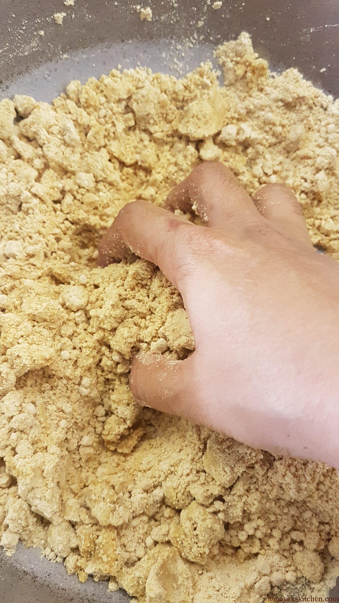 Breaking any lumps in flour