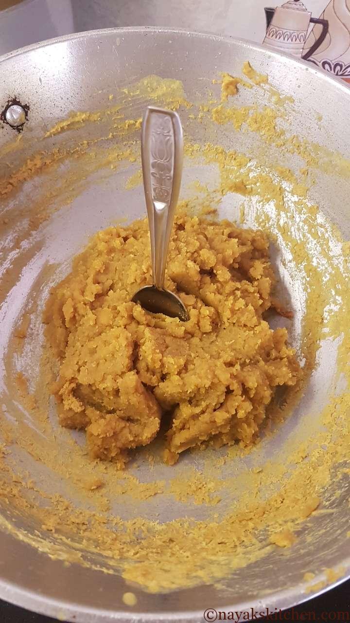 Spoon standing erect in puran - Puran ready