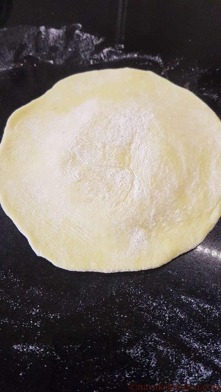 Rolling the dough into a disc